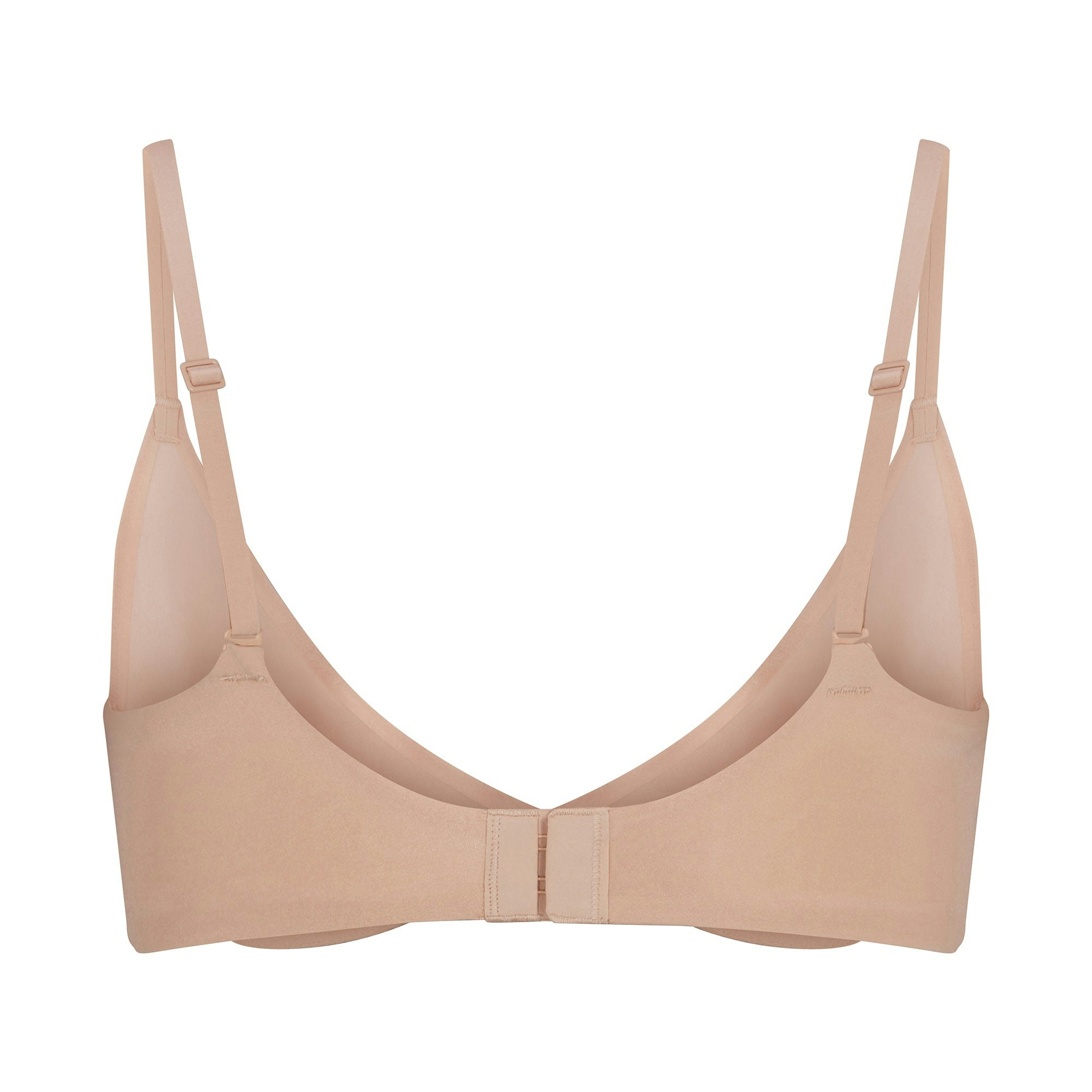 WEIGHTLESS SCOOP BRA LAYS FLAT ON A WHITE BACKGROUND | FLT