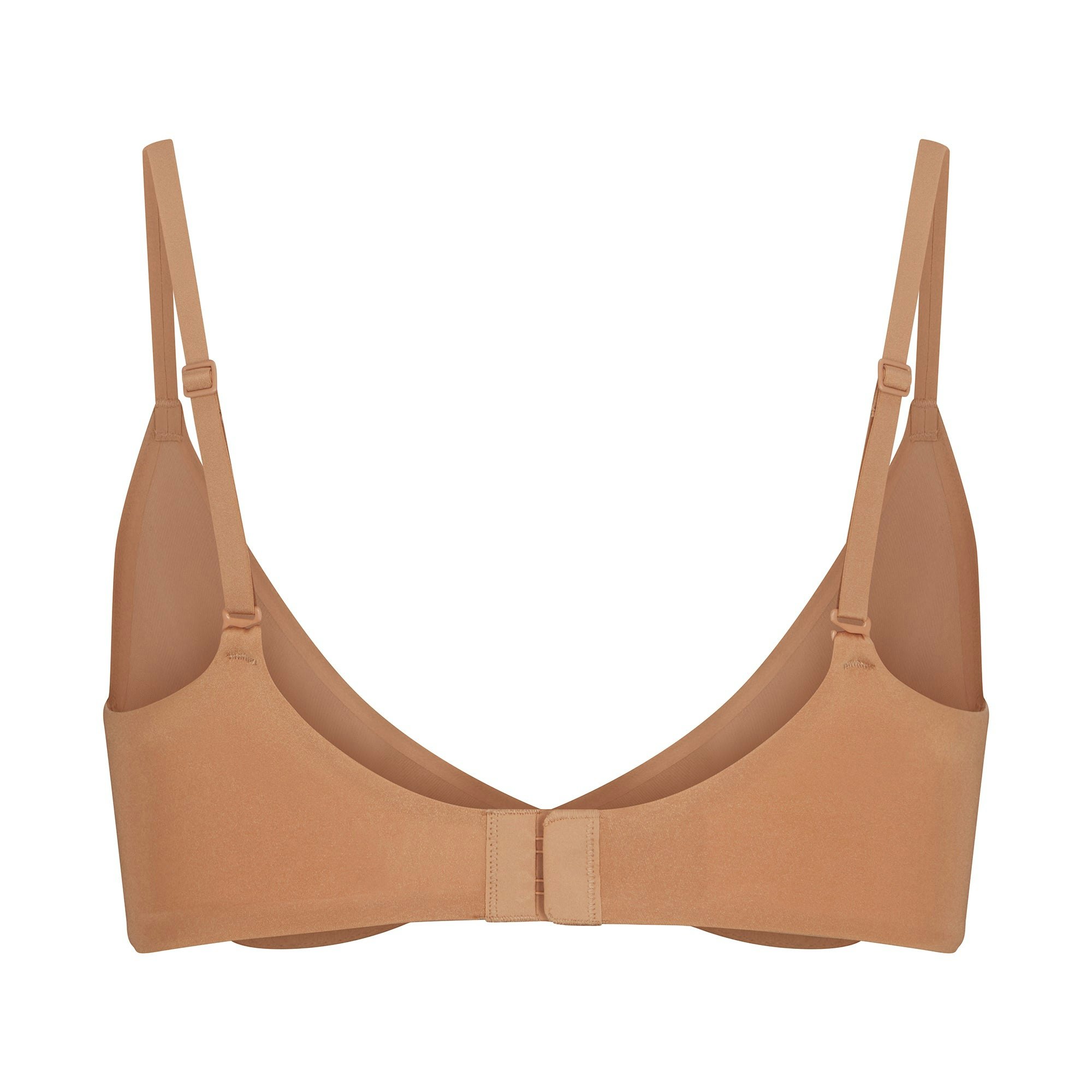 WEIGHTLESS SCOOP BRA LAYS FLAT ON A WHITE BACKGROUND | FLT