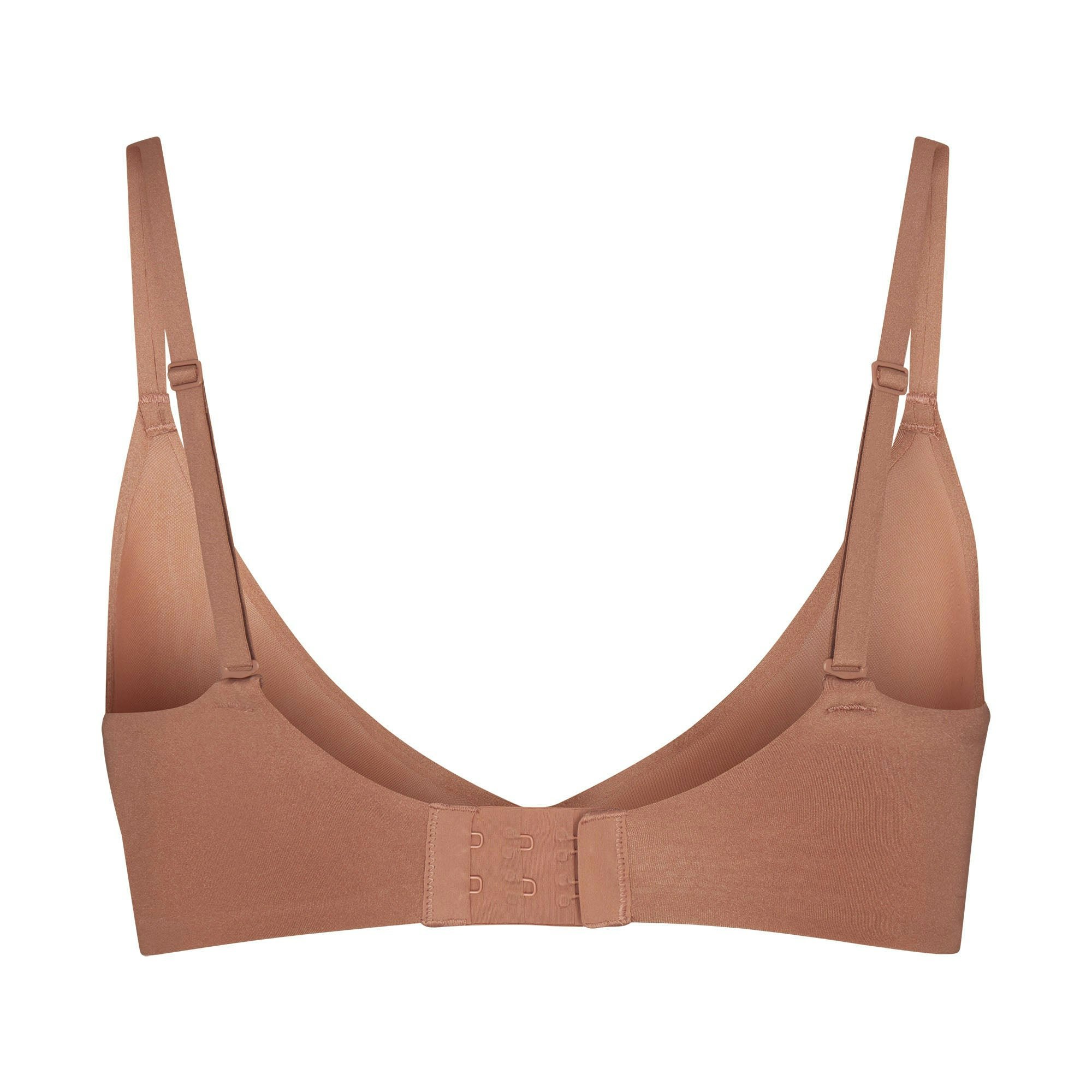 WEIGHTLESS SCOOP BRA LAYS FLAT ON A WHITE BACKGROUND | FLT