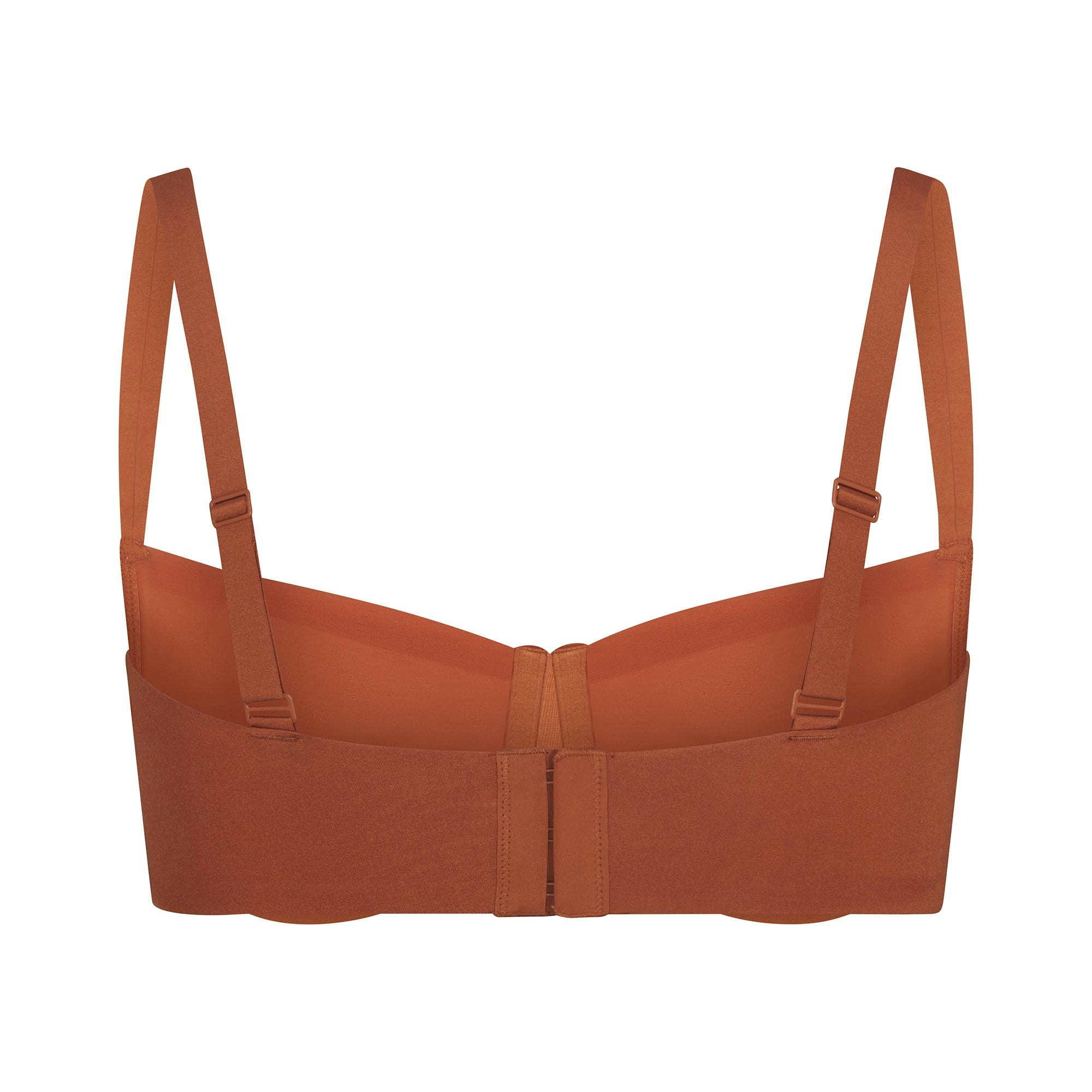 NO SHOW MOLDED UNLINED BALCONETTE BRA LAYS FLAT ON A WHITE BACKGROUND | FLT