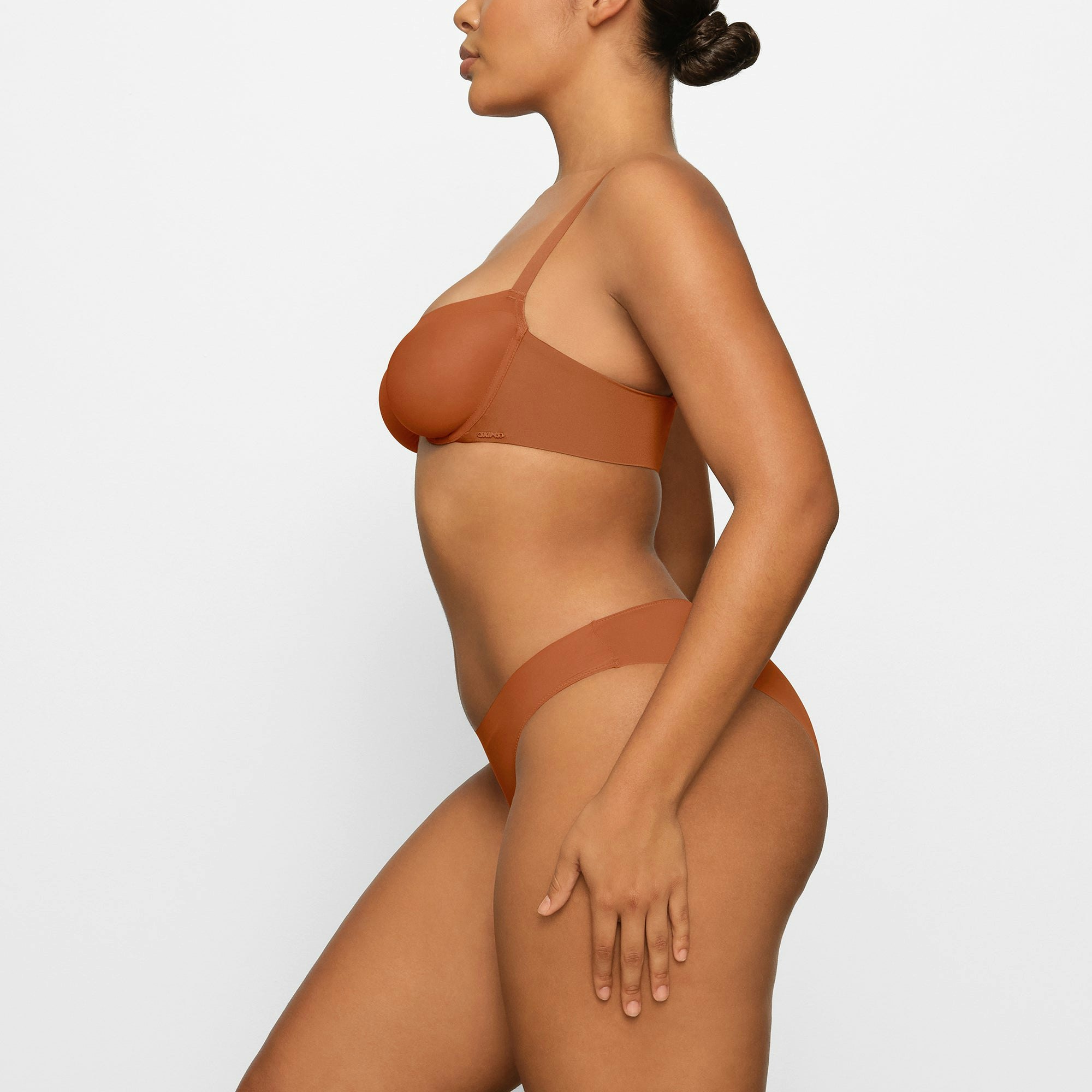 NO SHOW MOLDED UNLINED BALCONETTE BRA WORN BY A MODEL IN SIDE VIEW