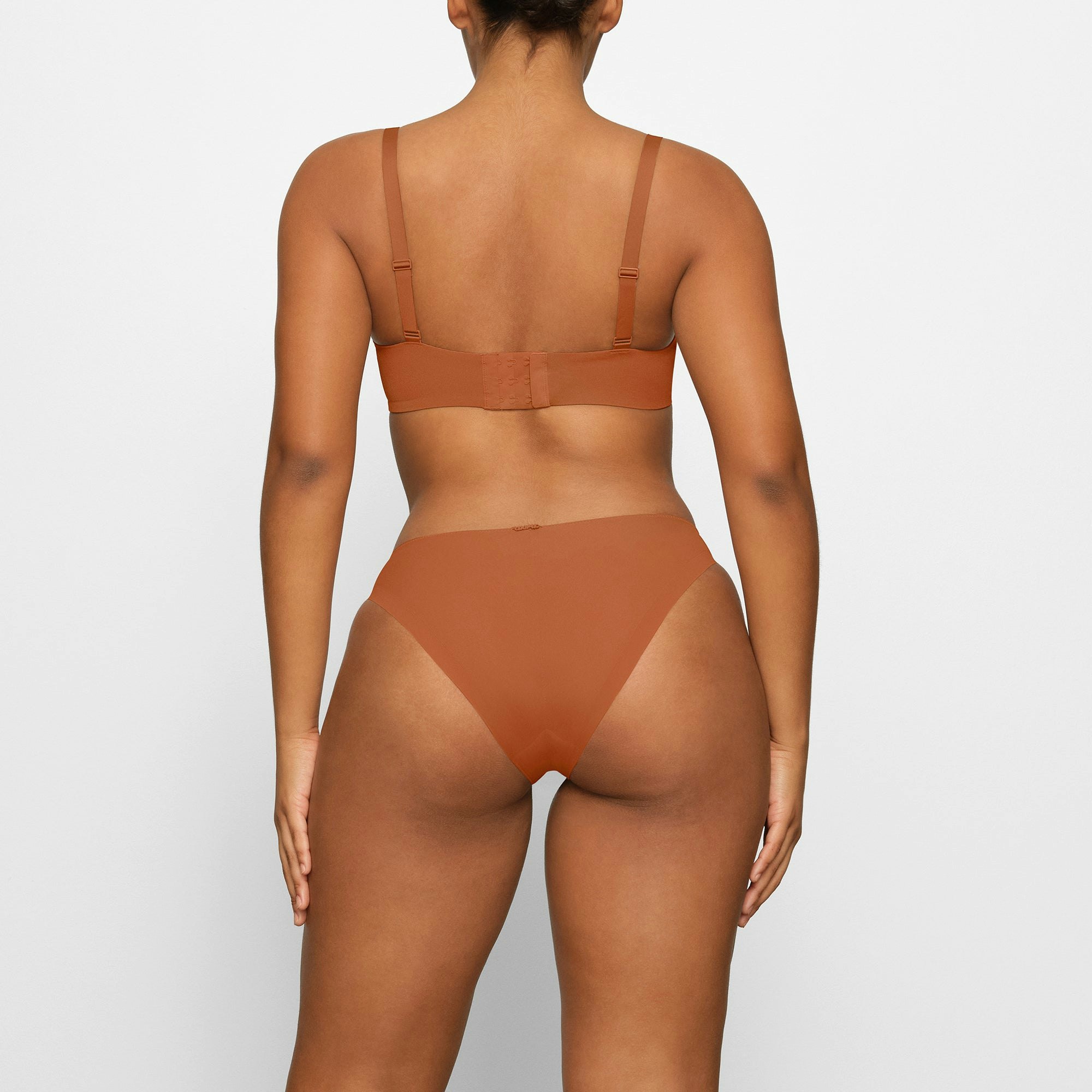 NO SHOW MOLDED UNLINED BALCONETTE BRA ON A MODEL BACK VIEW