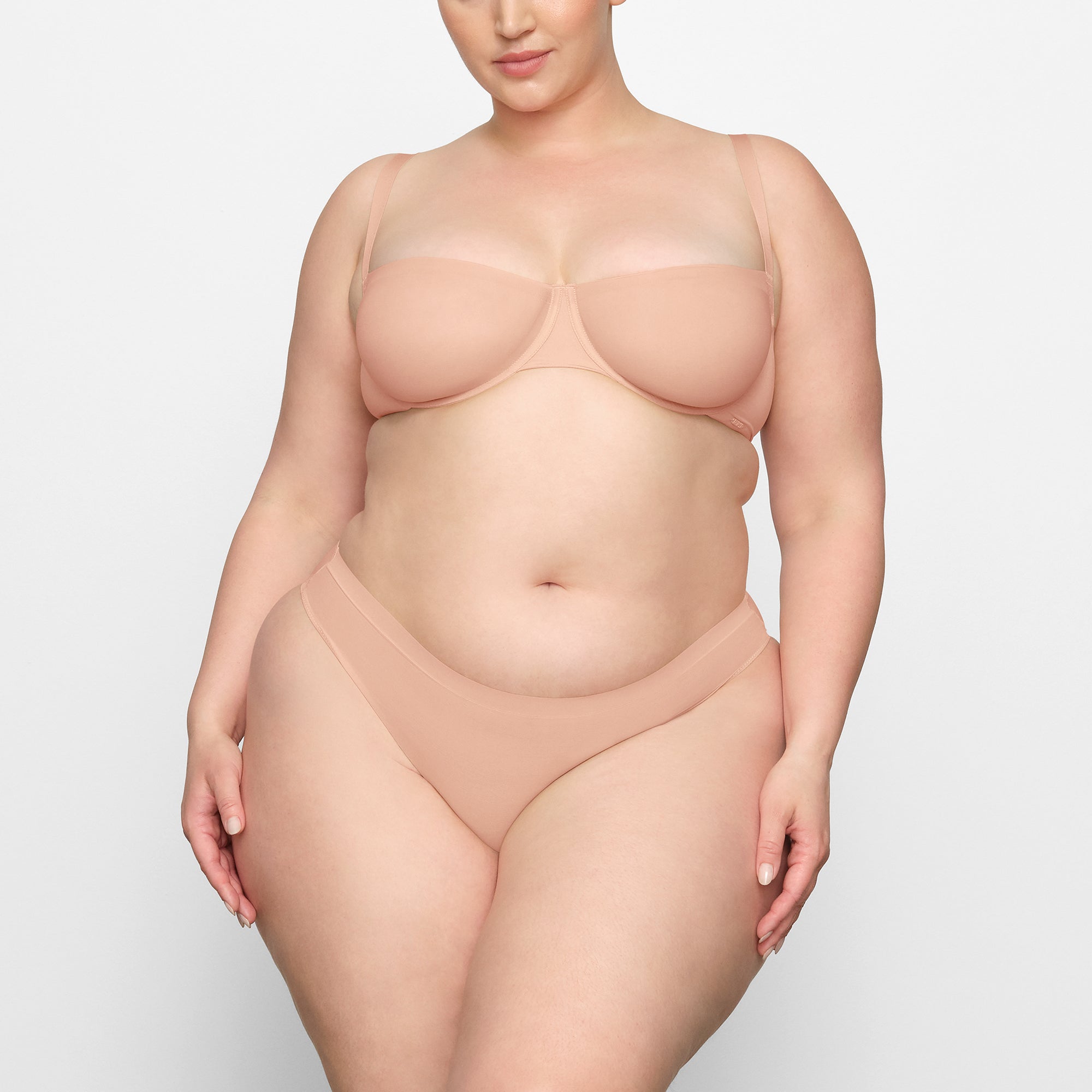 NO SHOW MOLDED UNLINED BALCONETTE BRA WORN BY A MODEL IN FRONT VIEW