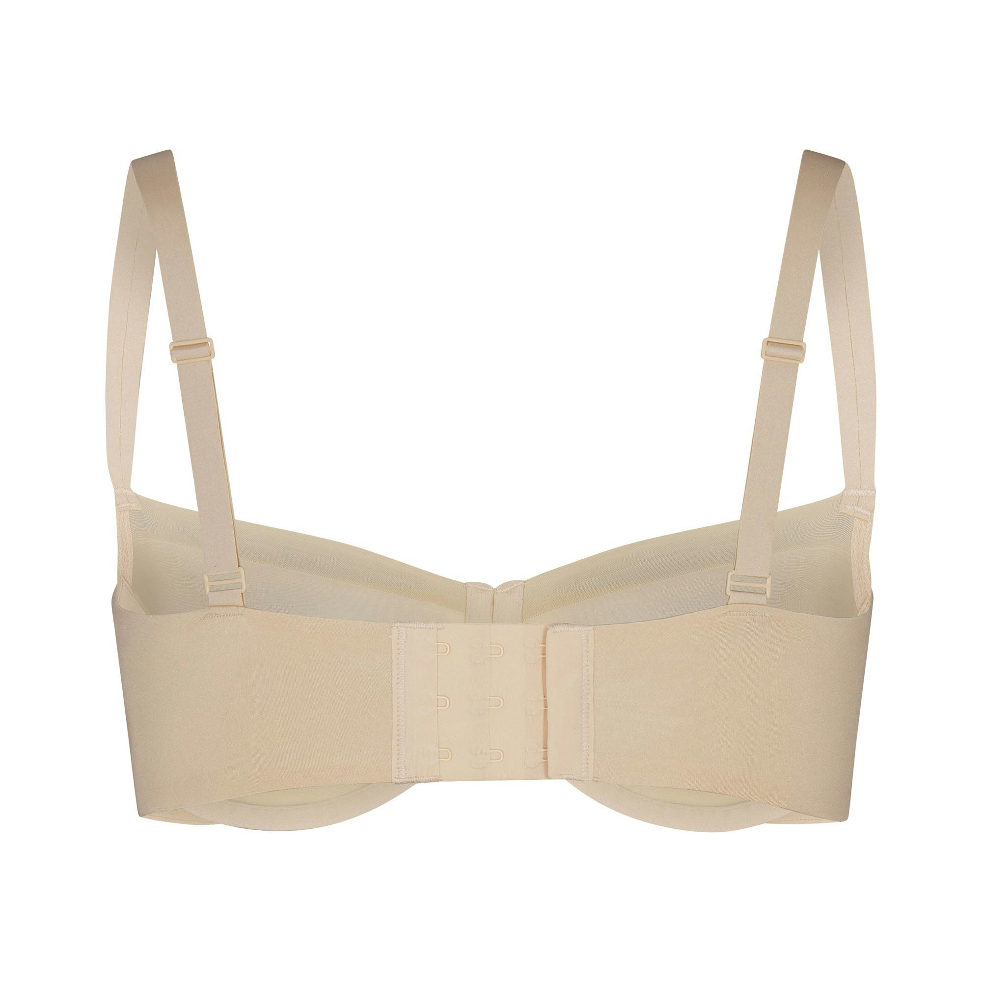 NO SHOW MOLDED UNLINED BALCONETTE BRA LAYS FLAT ON A WHITE BACKGROUND | FLT