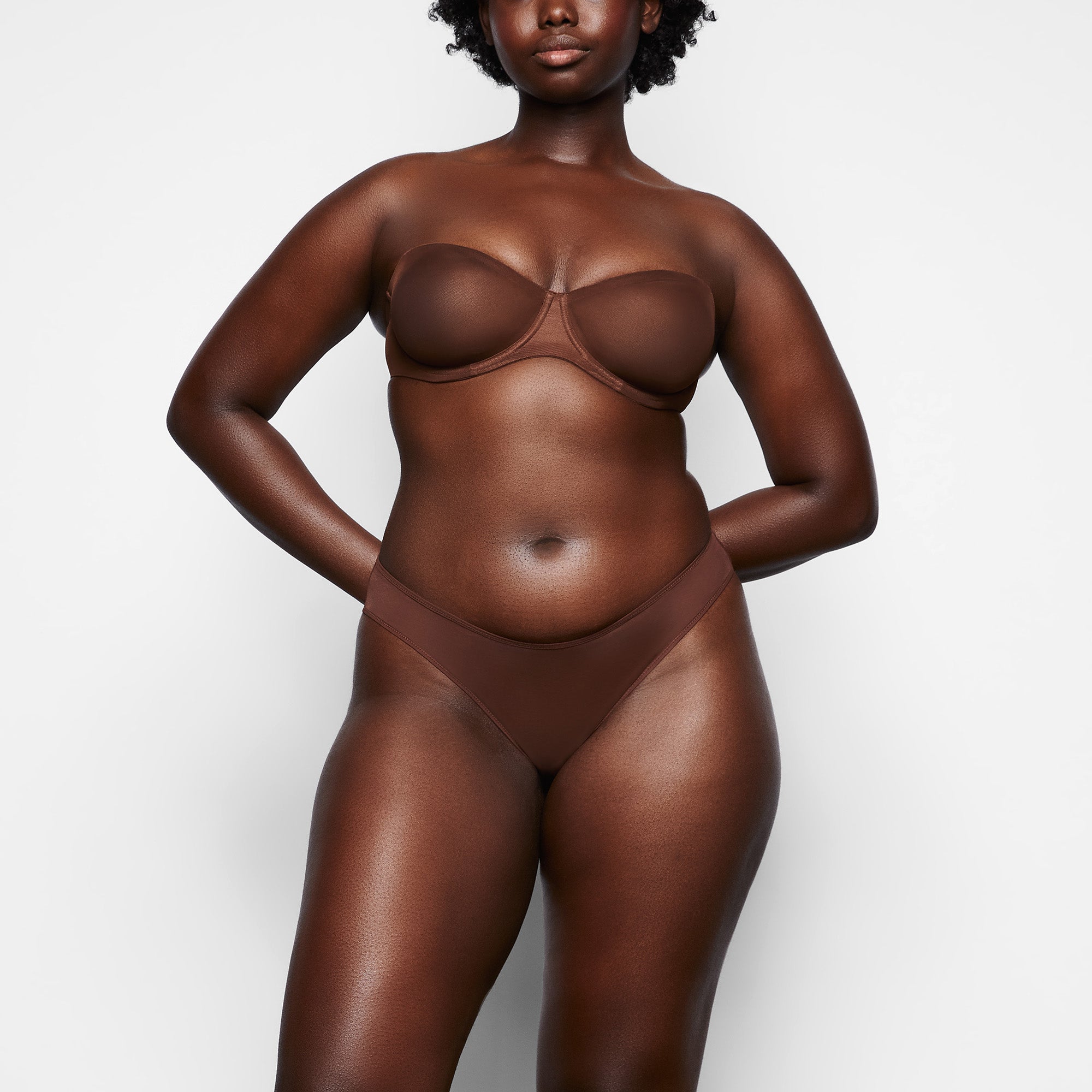 ULTRA FINE MESH STRAPLESS BRA WORN BY A MODEL IN FRONT VIEW