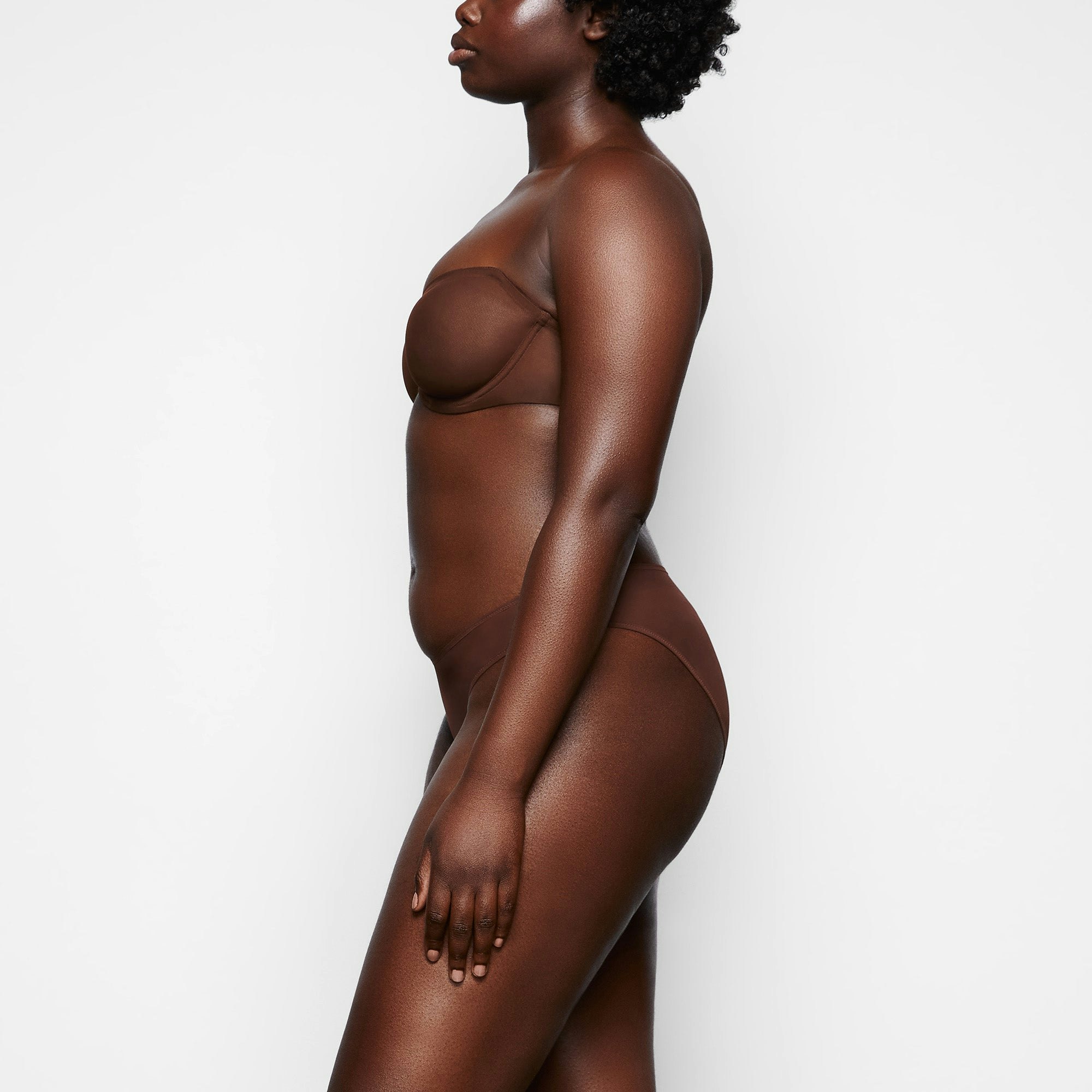 ULTRA FINE MESH STRAPLESS BRA WORN BY A MODEL IN SIDE VIEW