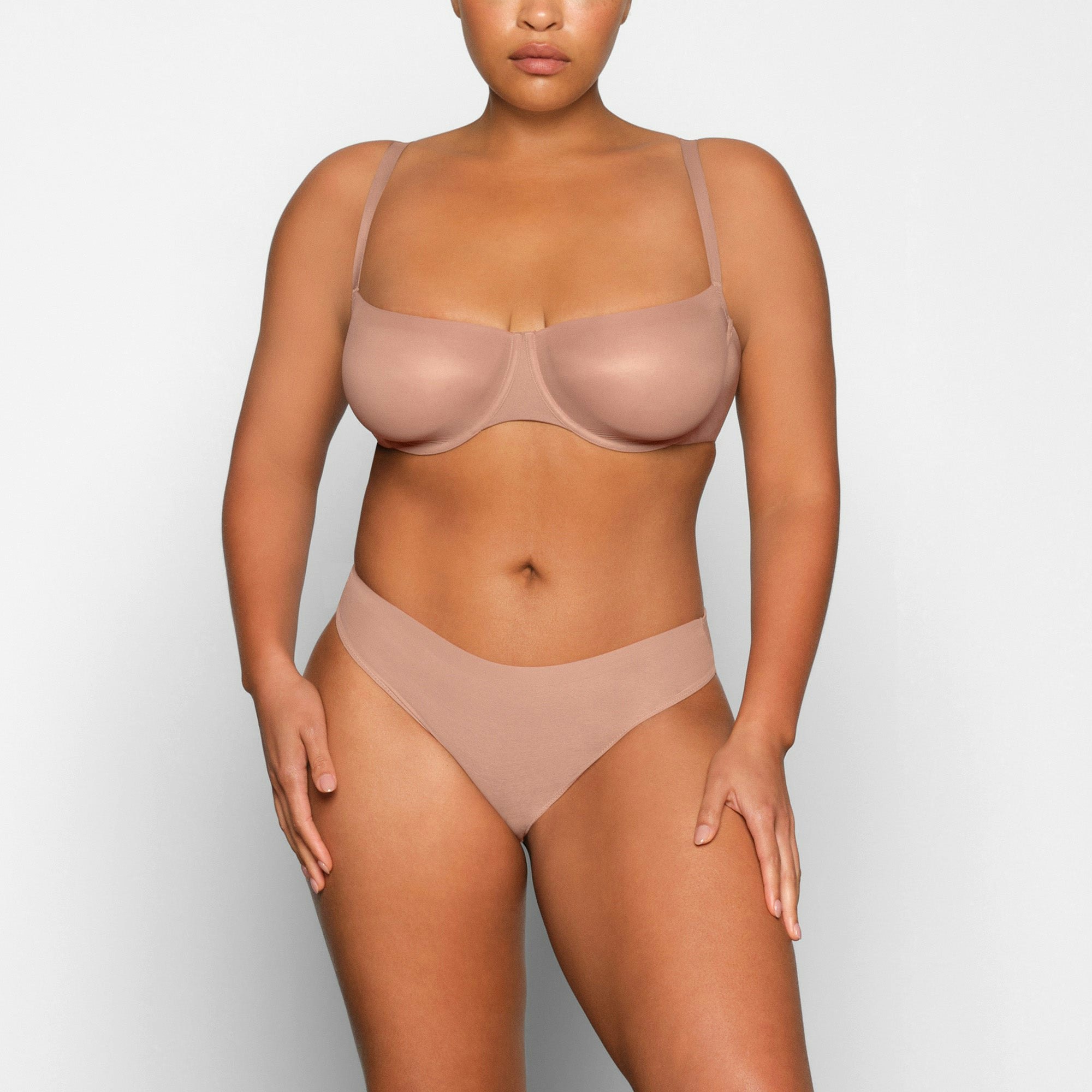 NO SHOW MOLDED UNLINED BALCONETTE BRA WORN BY A MODEL IN FRONT VIEW