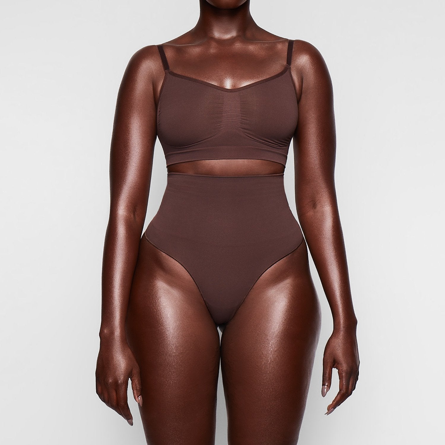 SEAMLESS SCULPT BRALETTE WORN BY A MODEL IN FRONT VIEW | SEE: M, L, XL