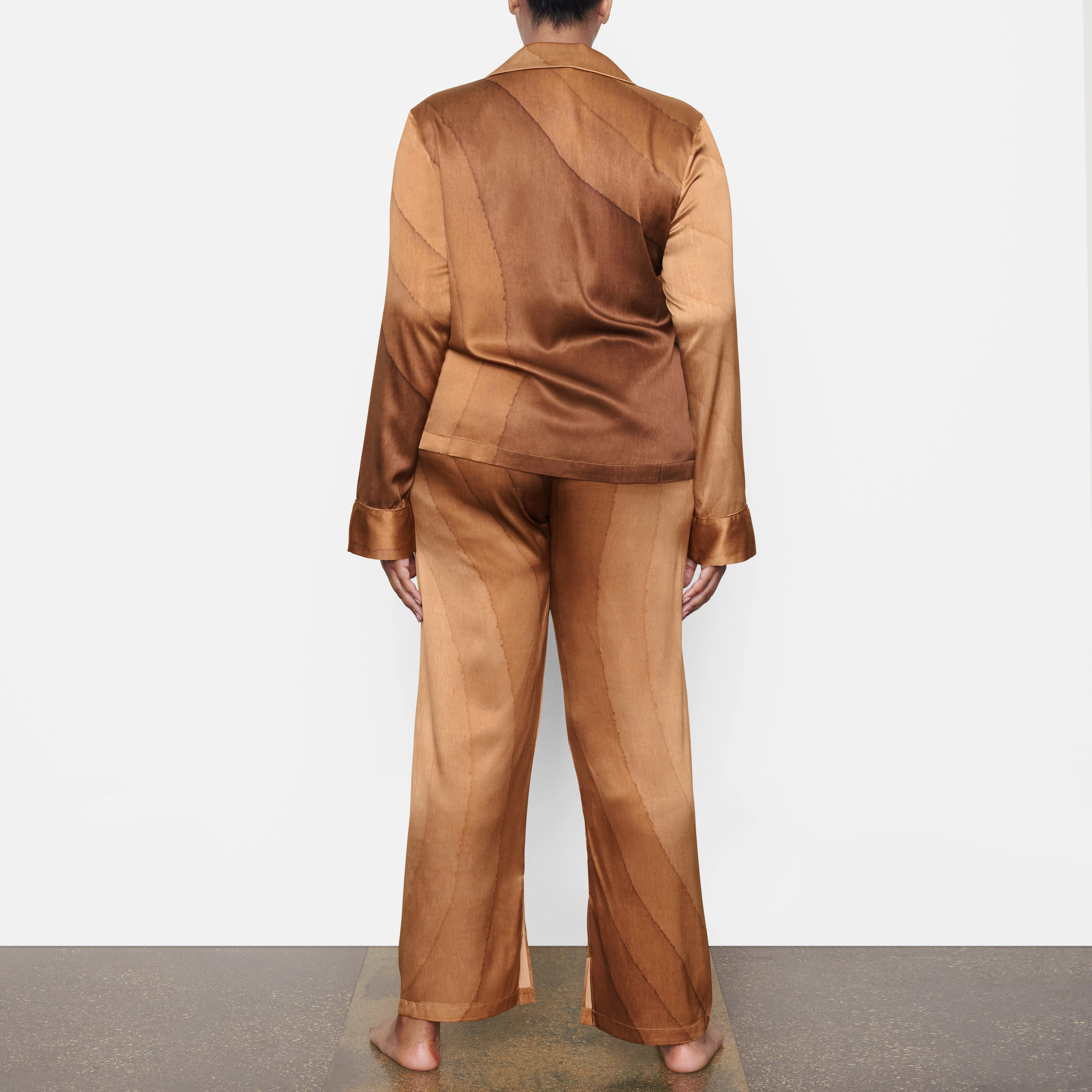 SILK BUTTON UP SHIRT ON A MODEL