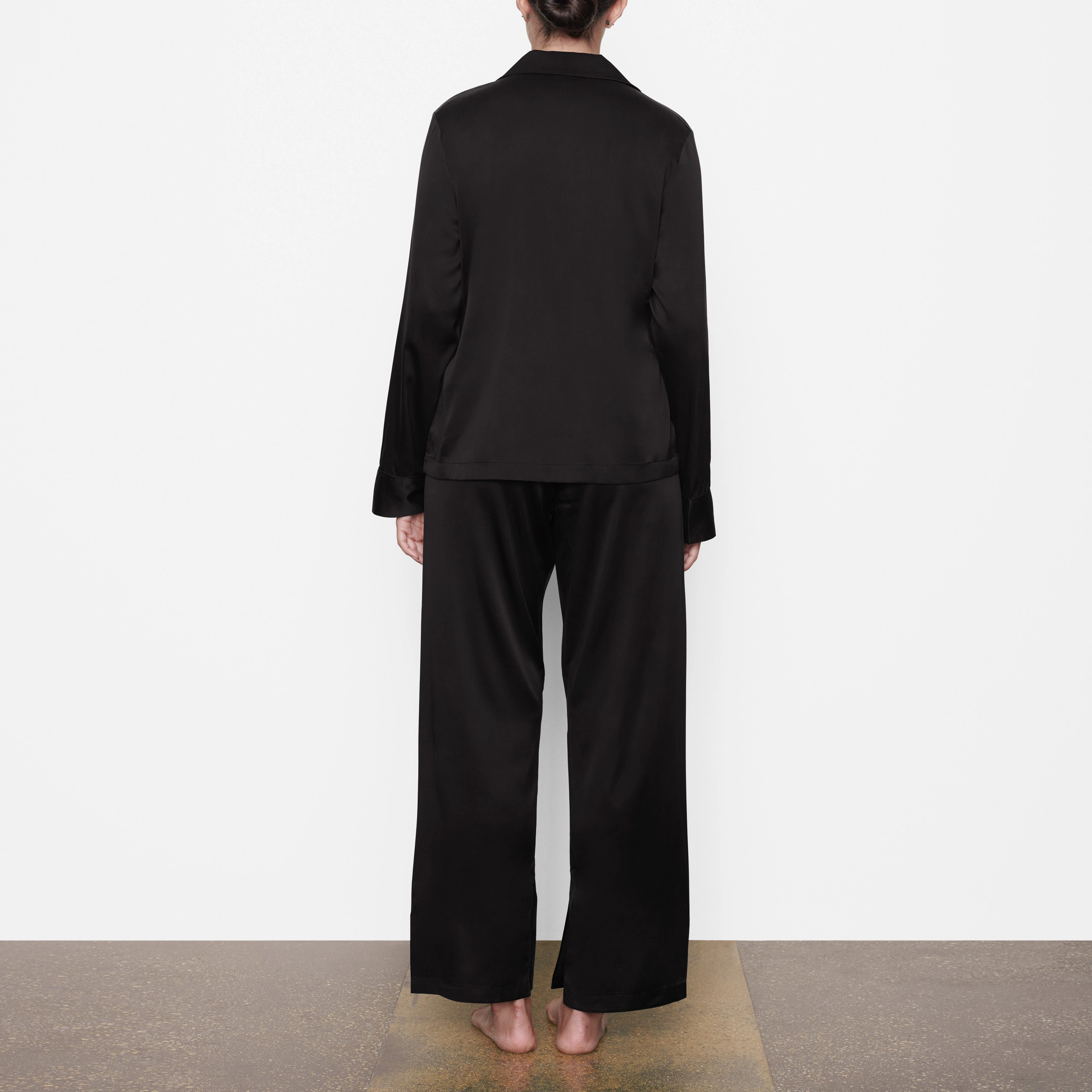 SILK BUTTON UP SHIRT ON A MODEL