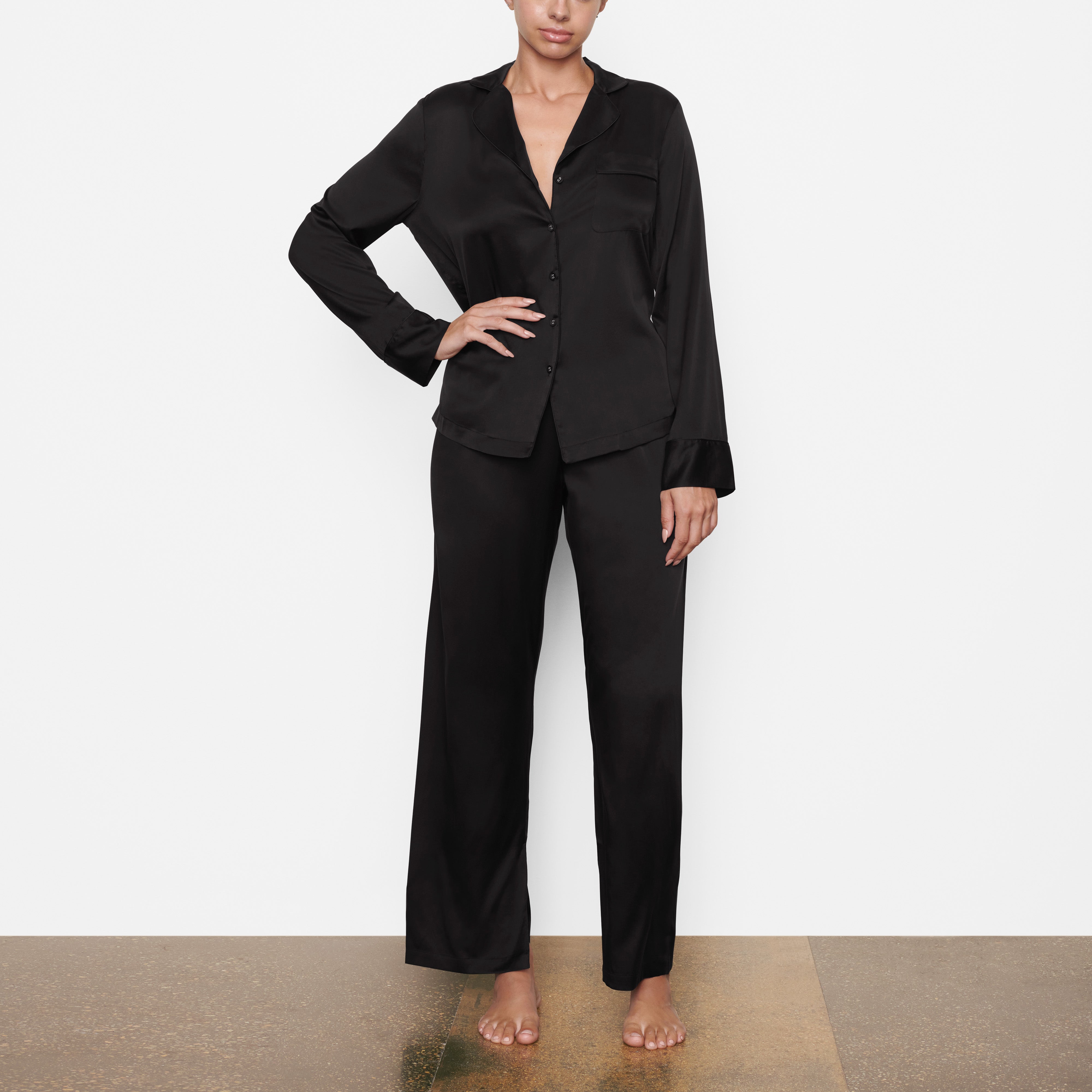 SILK BUTTON UP SHIRT ON A MODEL