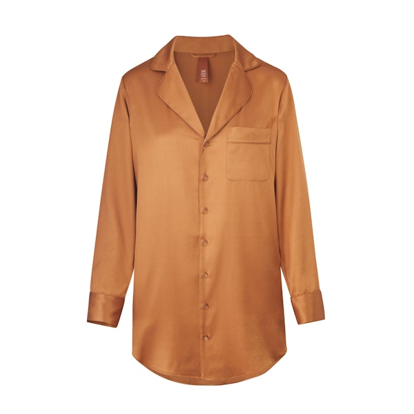 SILK BUTTON UP NIGHT DRESS LAYS FLAT ON A WHITE BACKGROUND