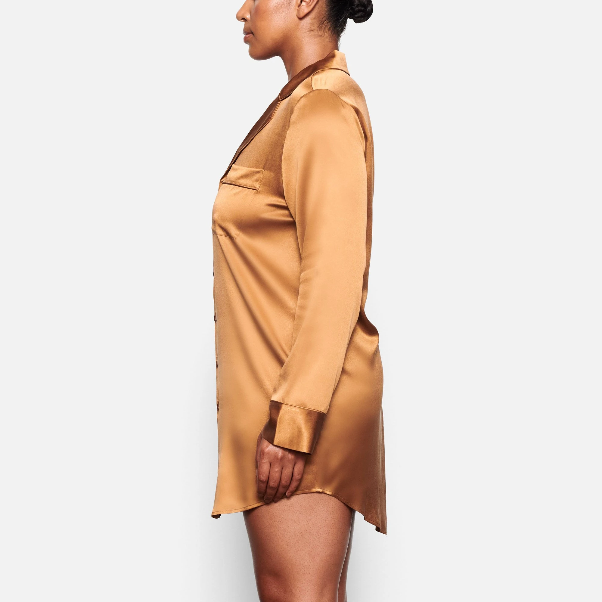 SIDE VIEW OF THE SILK BUTTON UP NIGHT DRESS ON A MODEL