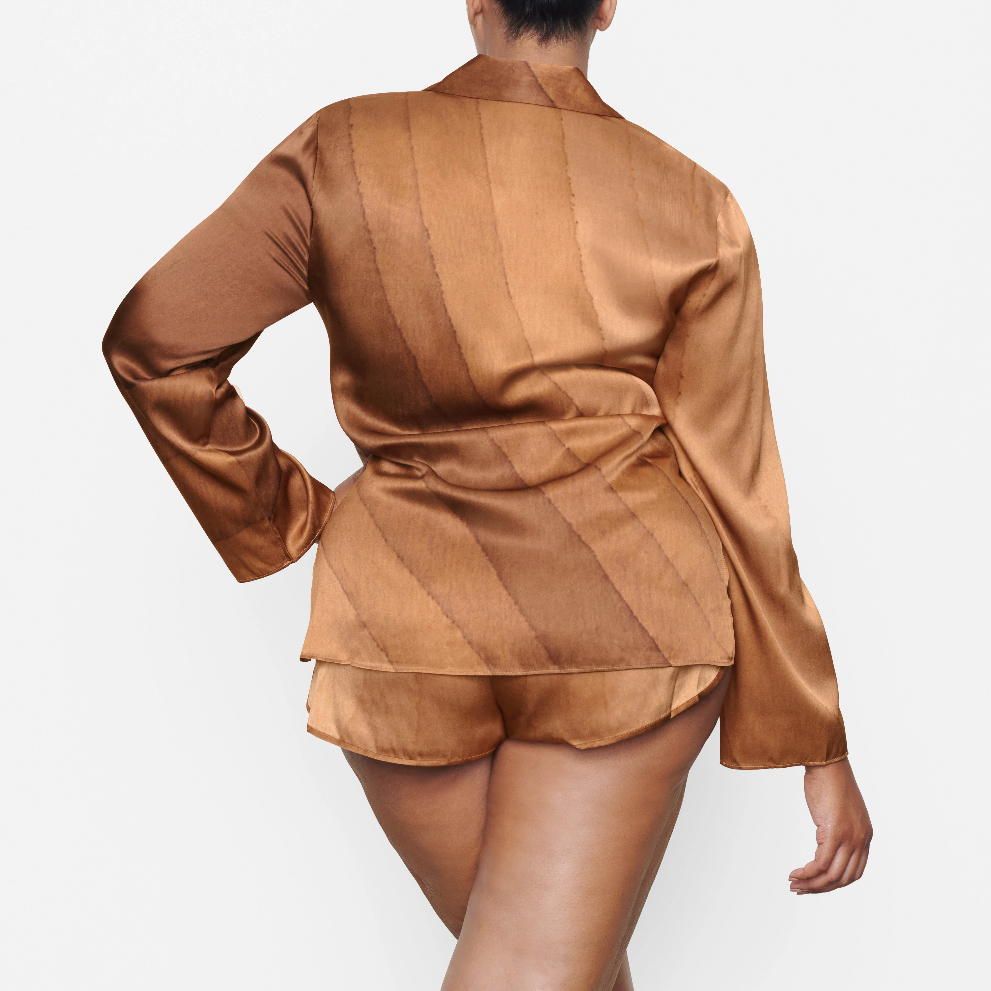 SILK OPEN NECKLINE SLEEP TOP ON A MODEL