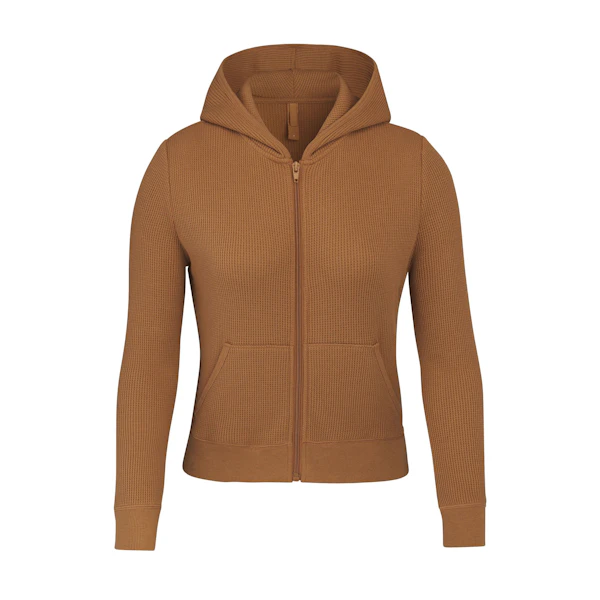 WAFFLE HOODIE LAYS FLAT ON A WHITE BACKGROUND