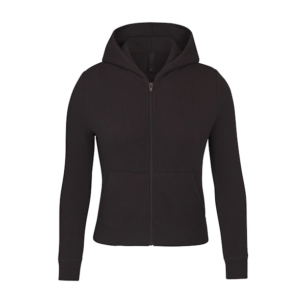 WAFFLE HOODIE LAYS FLAT ON A WHITE BACKGROUND