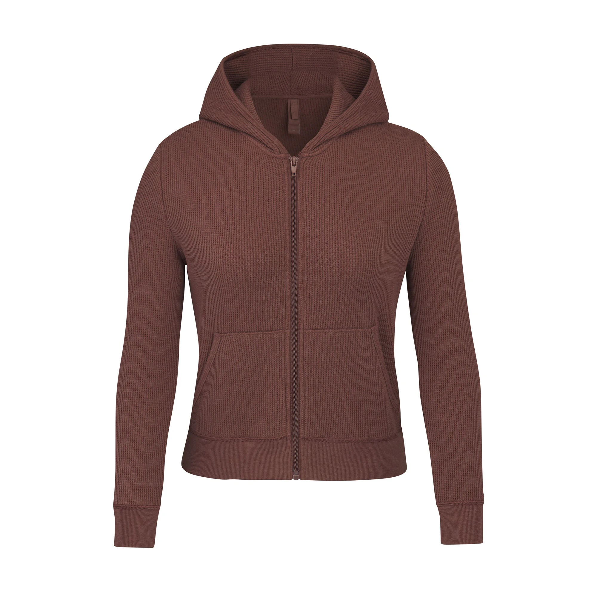 WAFFLE HOODIE LAYS FLAT ON A WHITE BACKGROUND