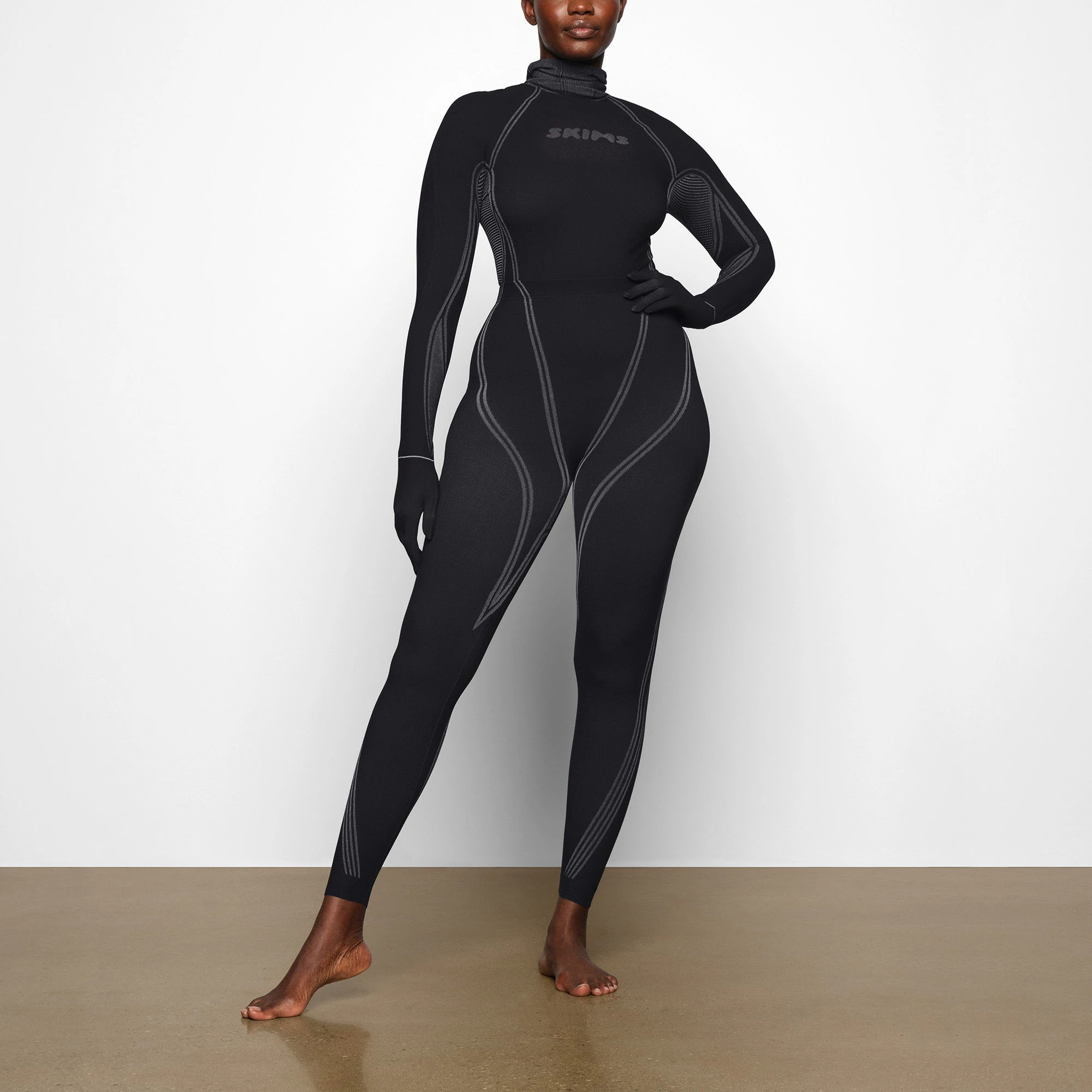 WARP KNIT LEGGING WORN BY A MODEL IN FRONT VIEW | SEE: M, L, XL