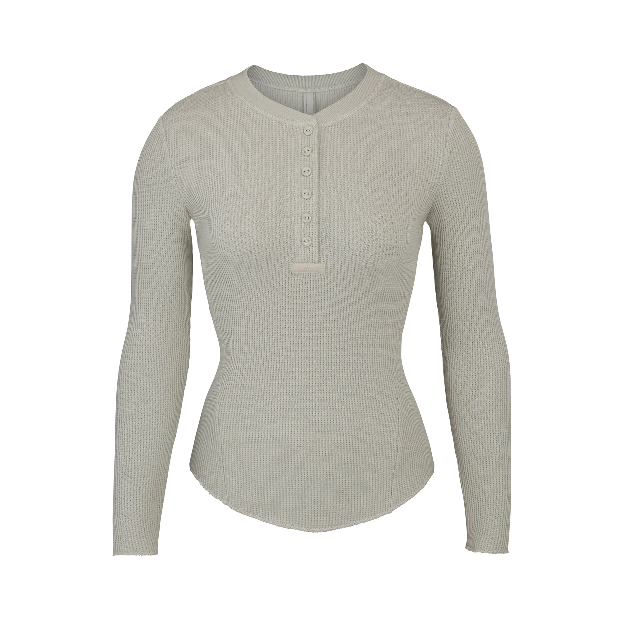 WAFFLE LONG SLEEVE HENLEY LAYS FLAT ON A WHITE BACKGROUND