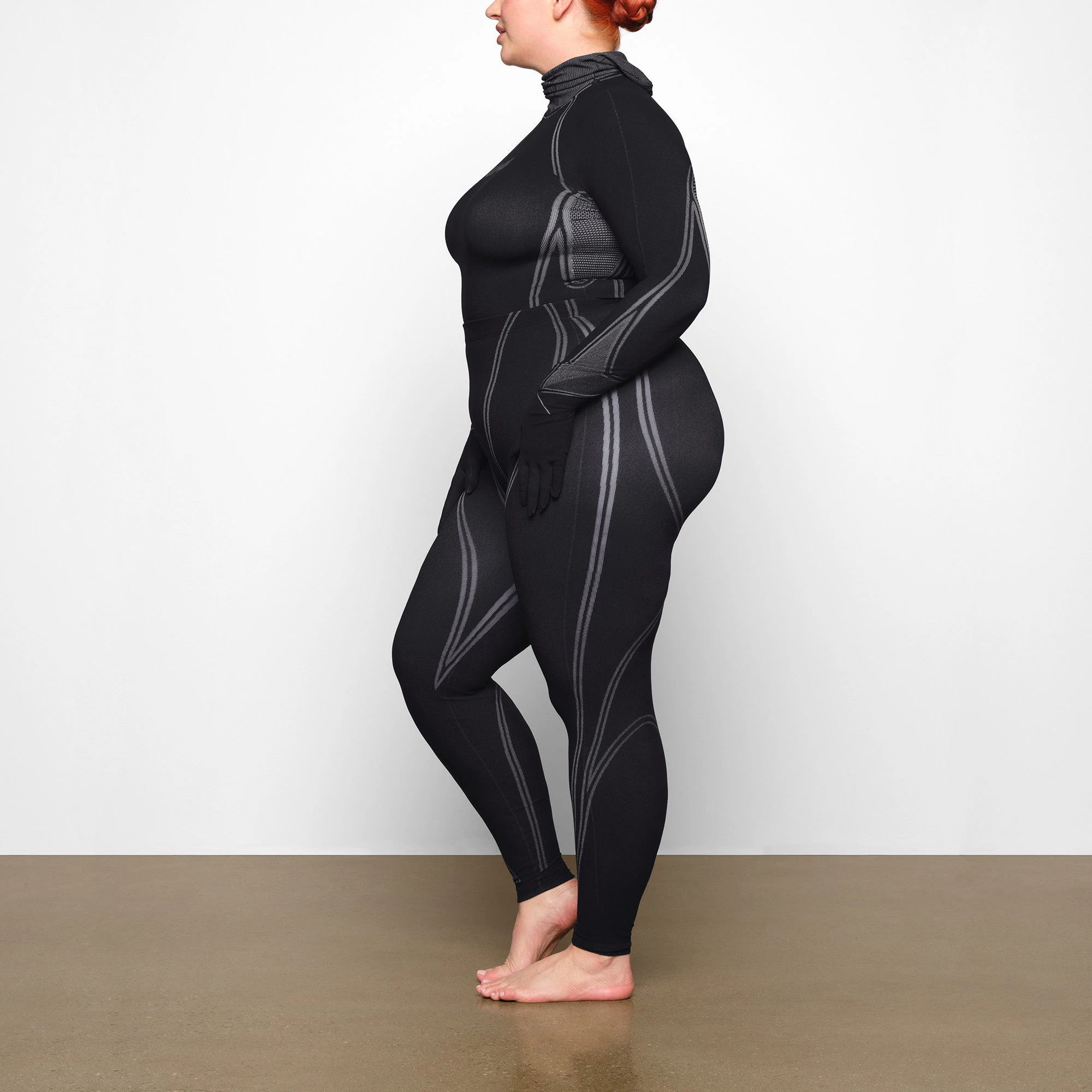 WARP KNIT TOP WORN BY A MODEL IN SIDE VIEW