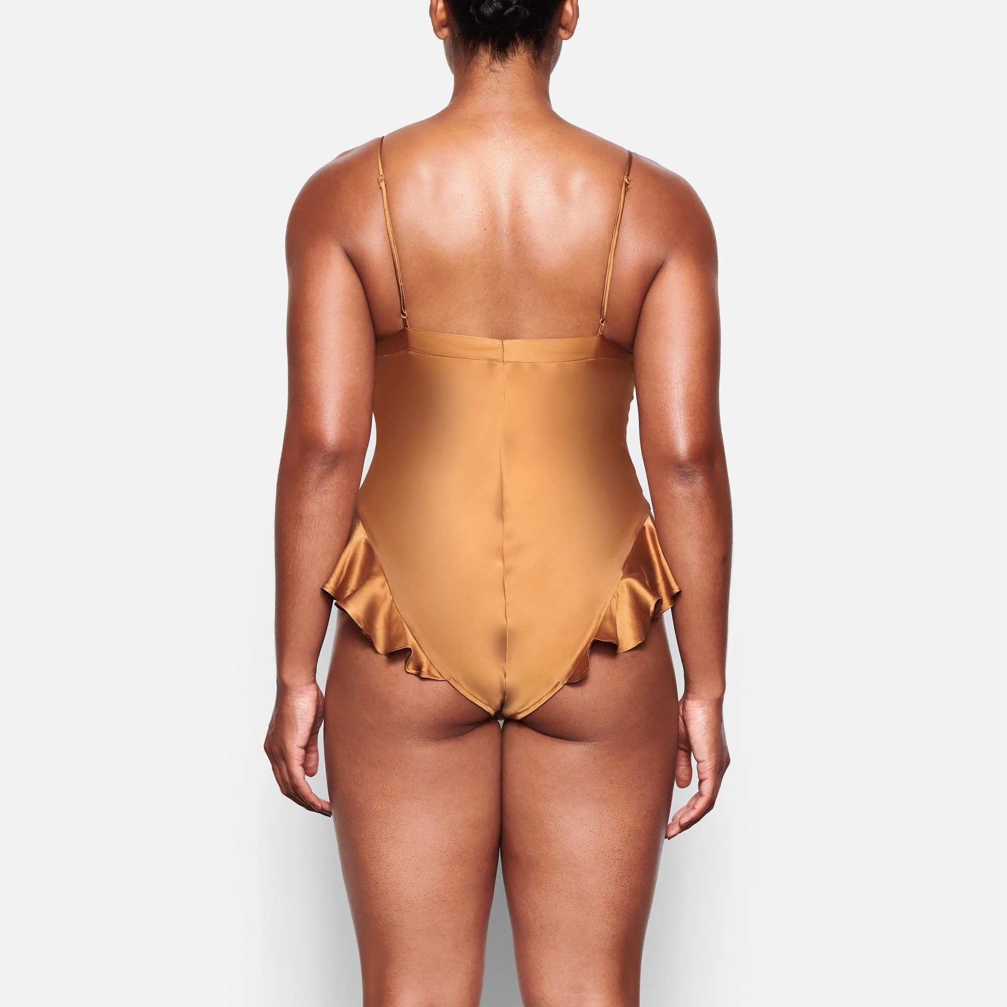 BACK VIEW OF THE SILK TEDDY ON A MODEL