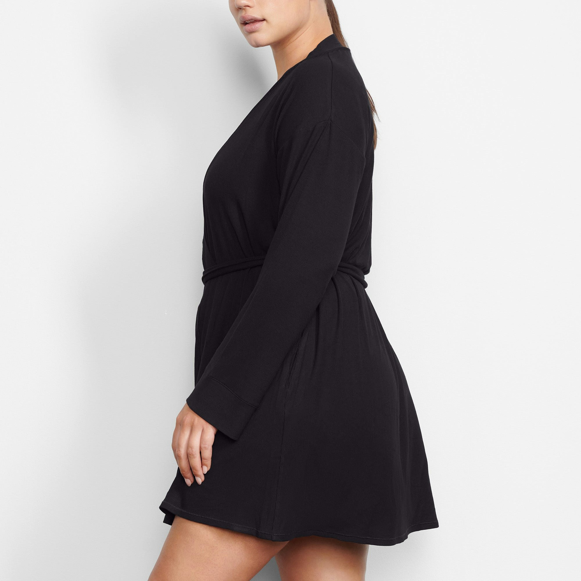 WORN BY A MODEL IN SIDE VIEW SOFT LOUNGE ROBE IN ONYX