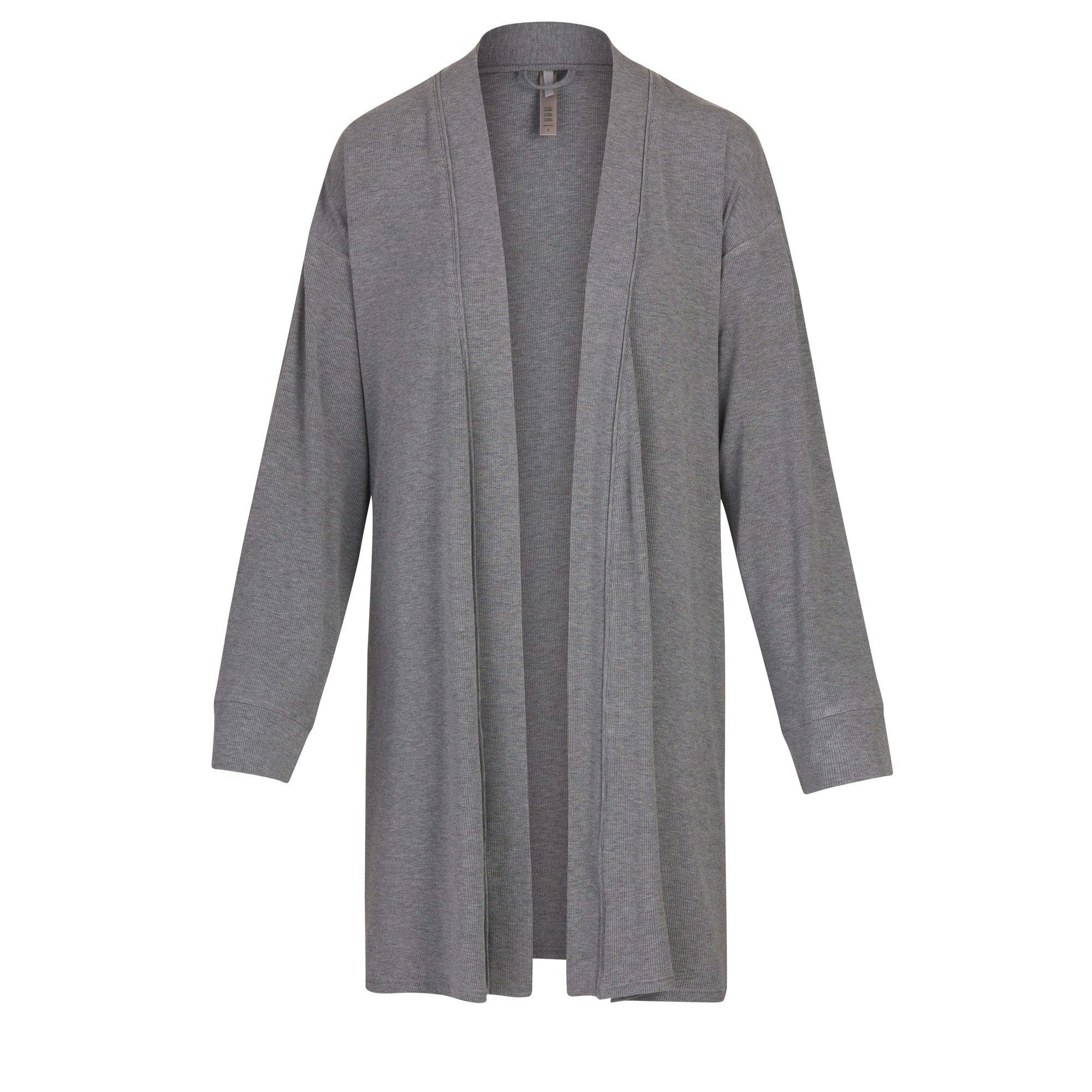 SOFT LOUNGE ROBE IS SHOWN ON A MODEL POSING IN STYLISTIC CAMPAIGN IMAGERY