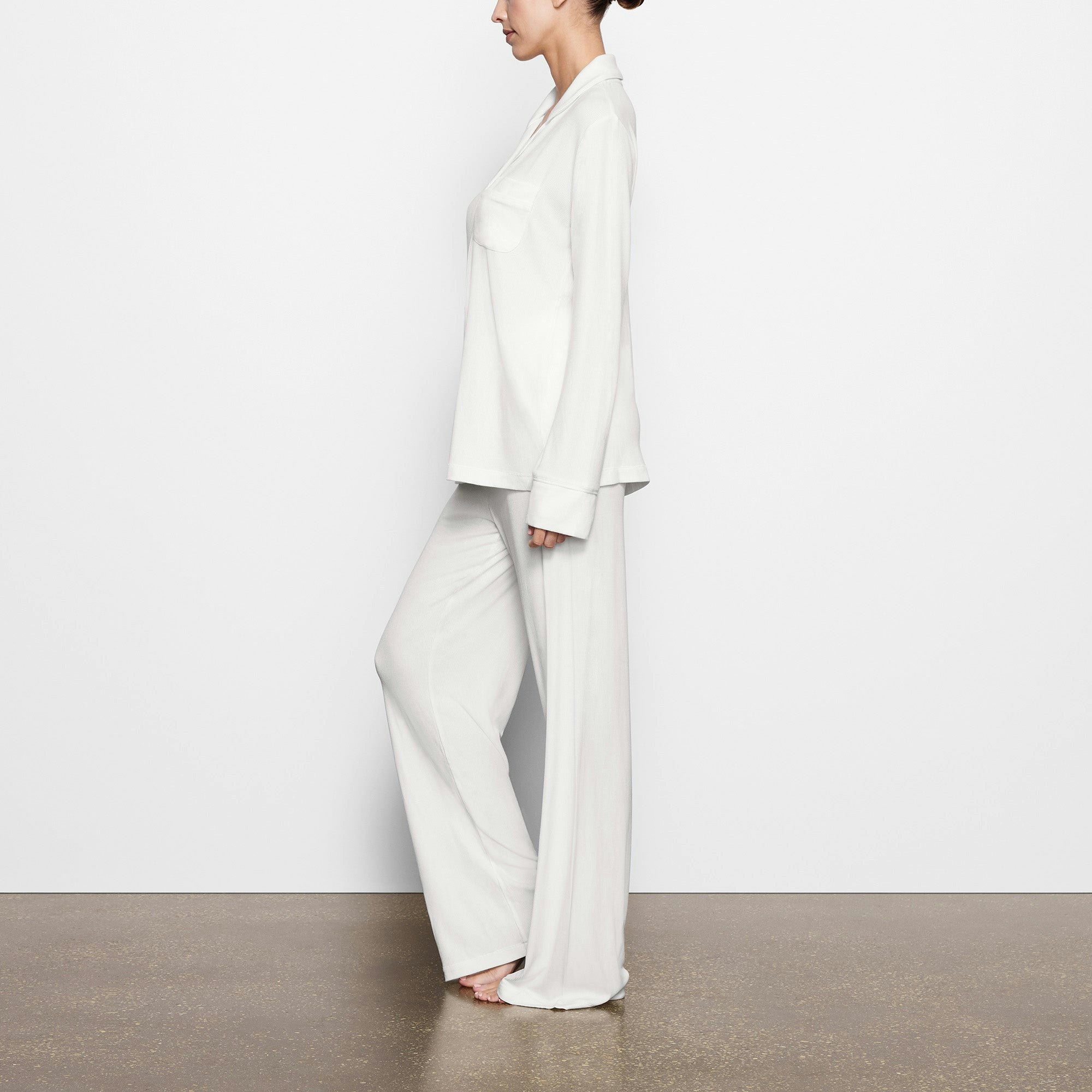 WORN BY A MODEL IN SIDE VIEW SOFT LOUNGE SLEEP SET