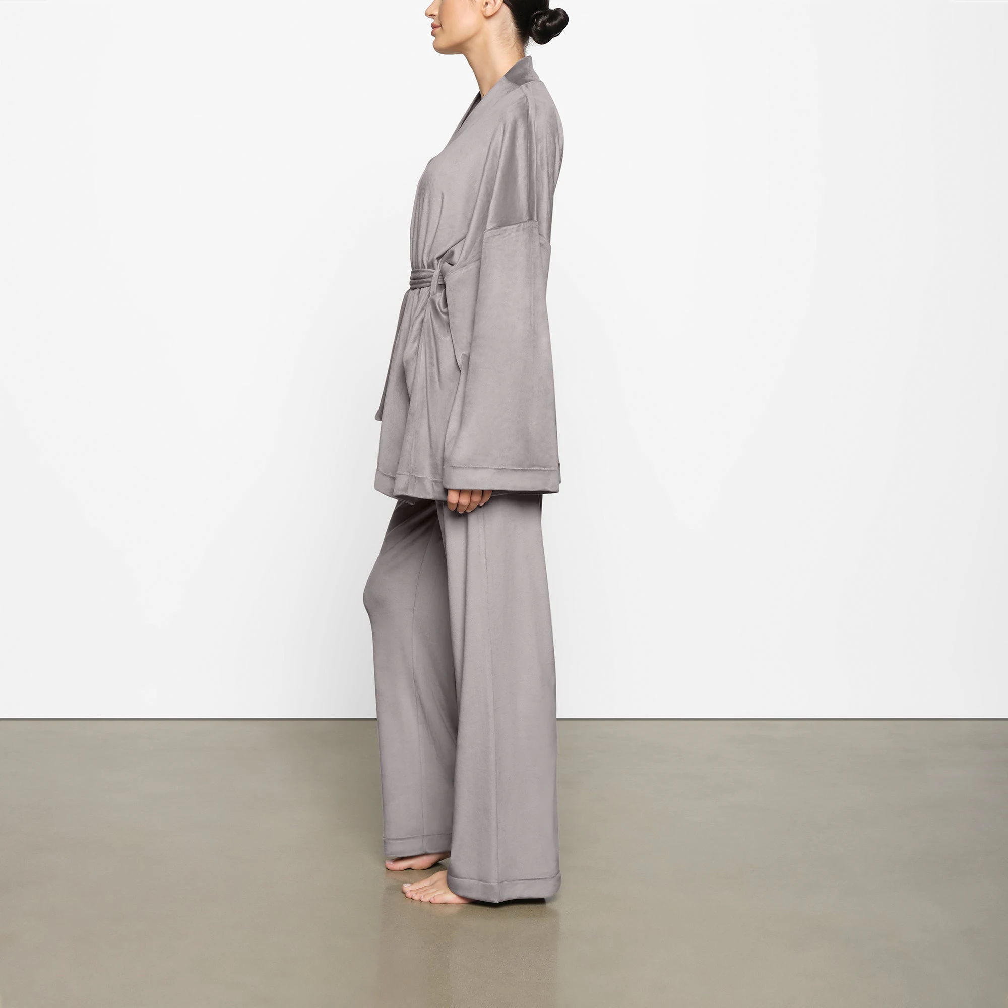 VELOUR WRAP SLEEP SET WORN BY A MODEL IN SIDE VIEW