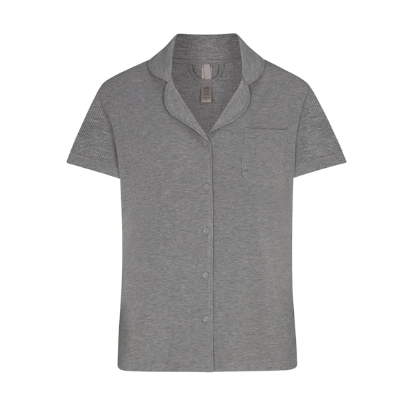 SOFT LOUNGE SHORT SLEEP SET LAYS FLAT ON A WHITE BACKGROUND | FLT