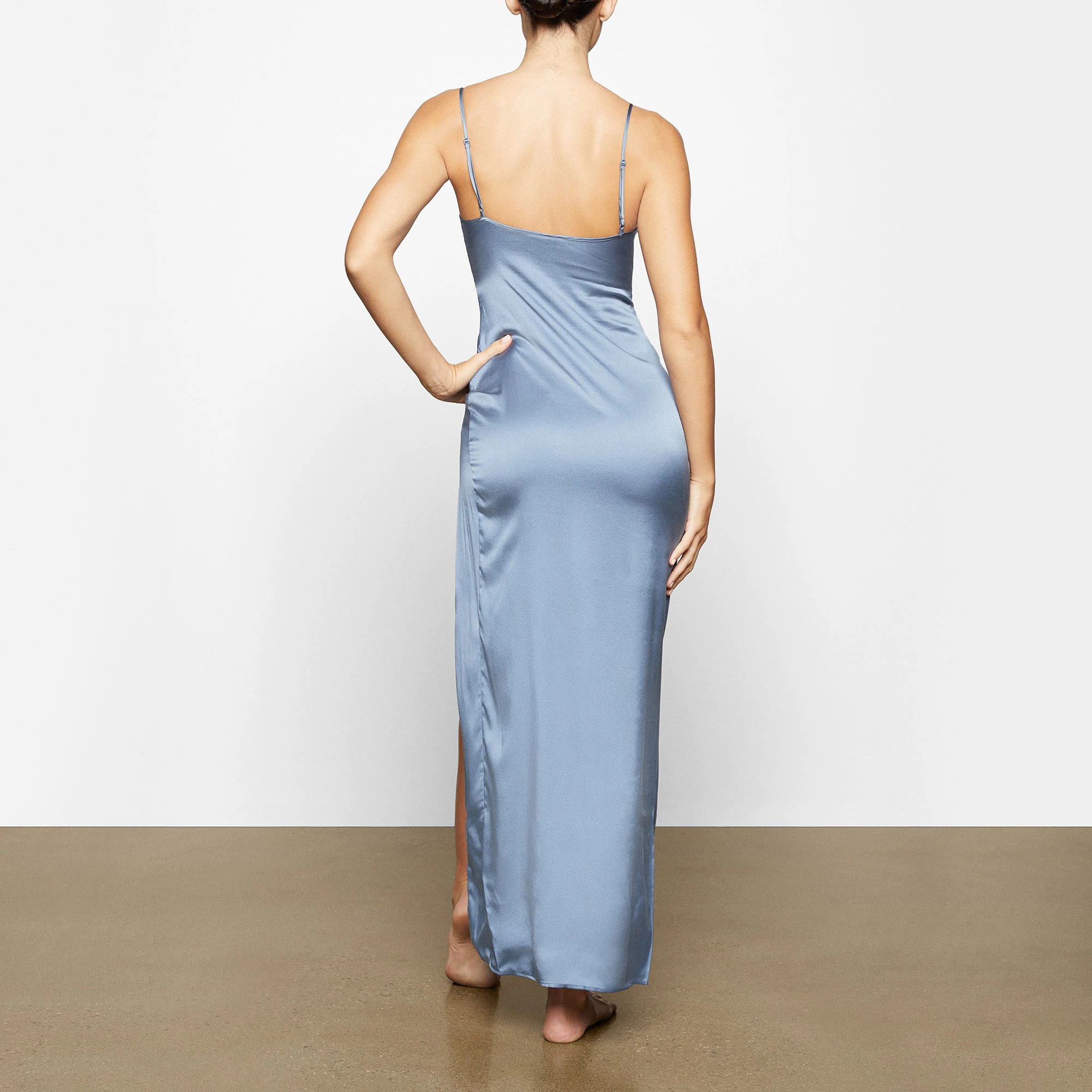 SILK SLEEP SLIP WITH HIGH SLIT WORN BY A MODEL IN BACK VIEW