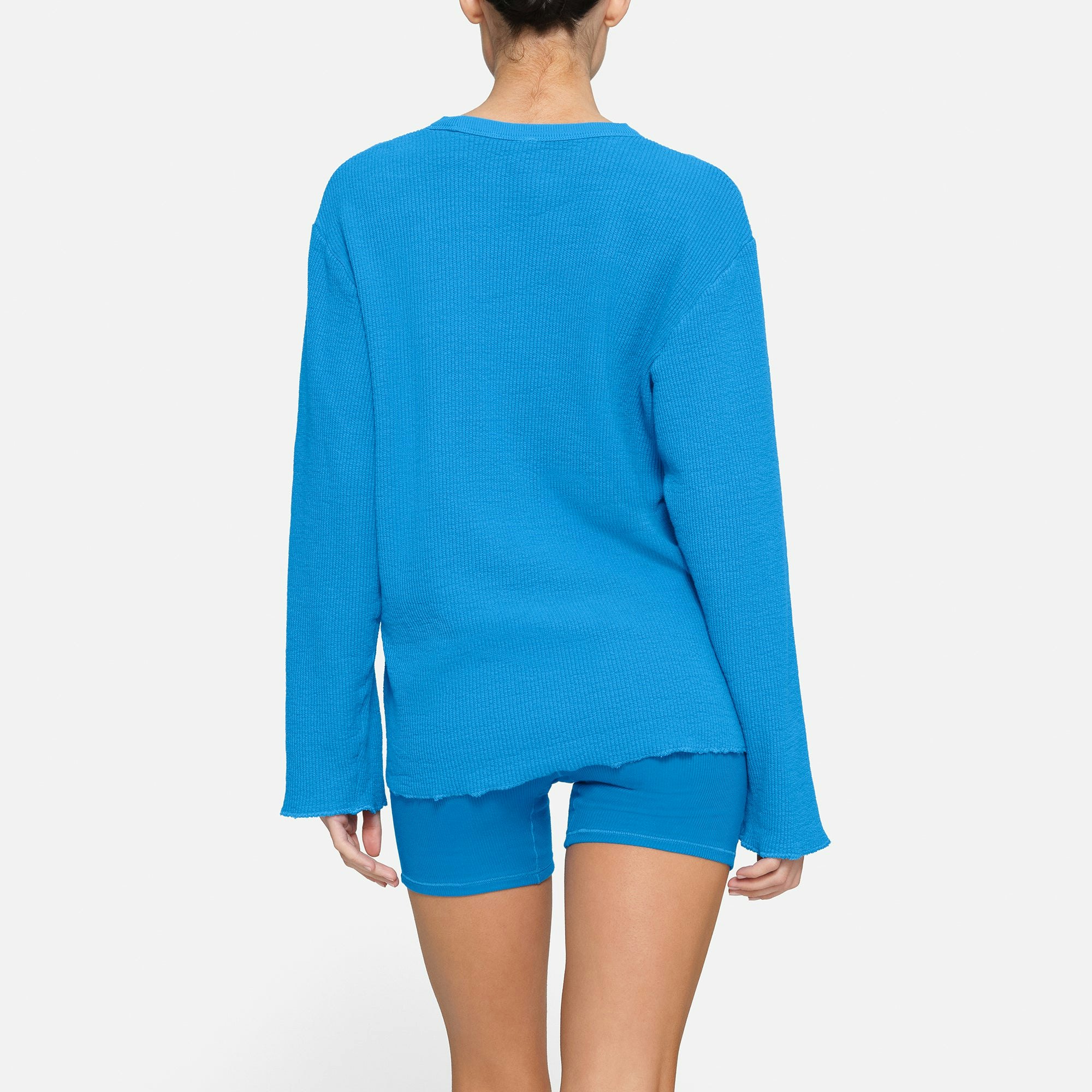 WAFFLE LONG SLEEVE T-SHIRT ON A MODEL IN BACK VIEW