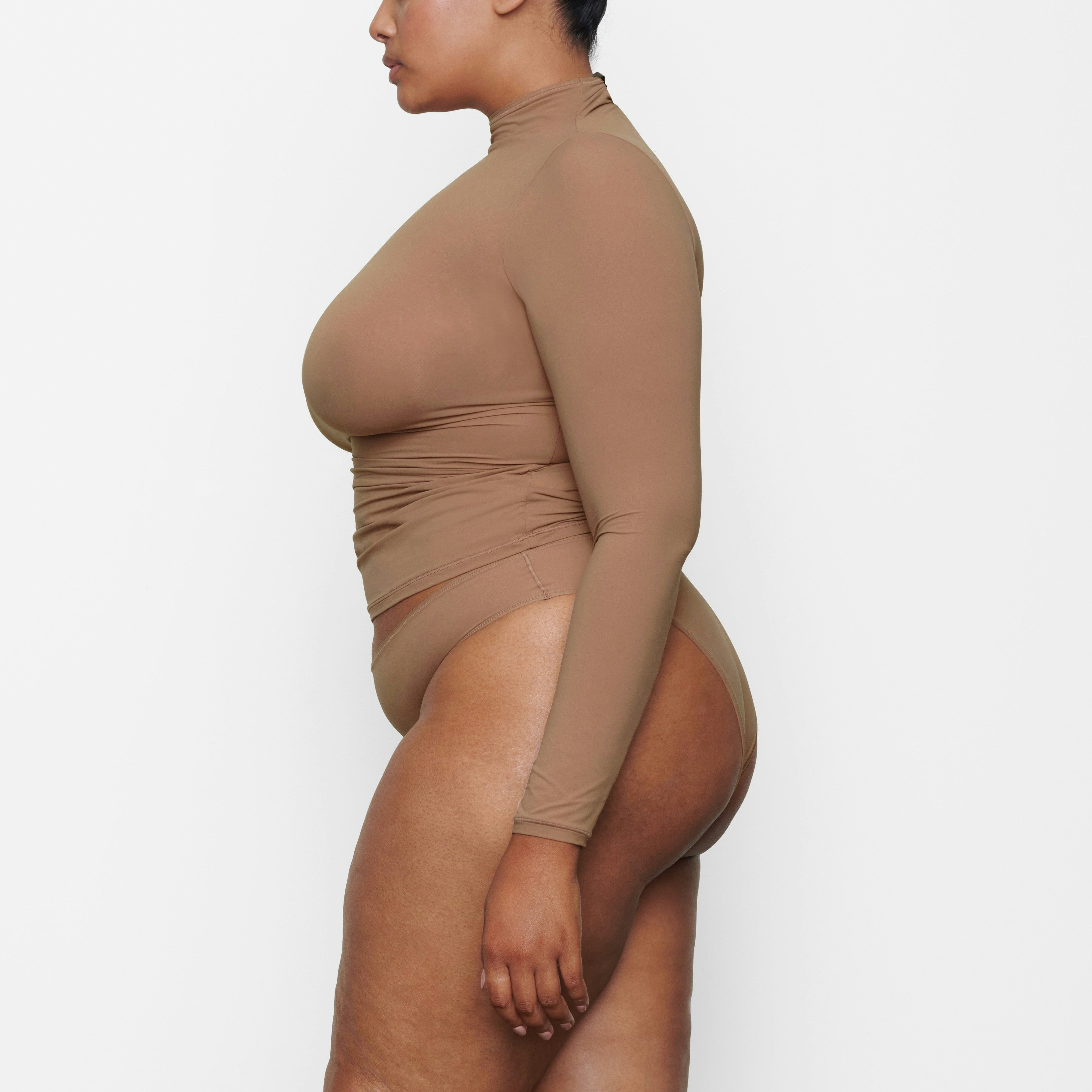 FITS EVERYBODY TURTLENECK TOP