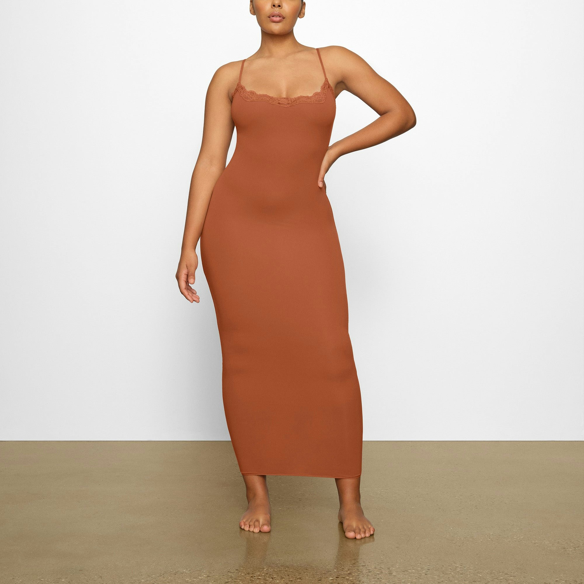 FITS EVERYBODY LACE LONG SLIP DRESS WORN BY A MODEL IN FRONT VIEW | SEE: M, L, XL