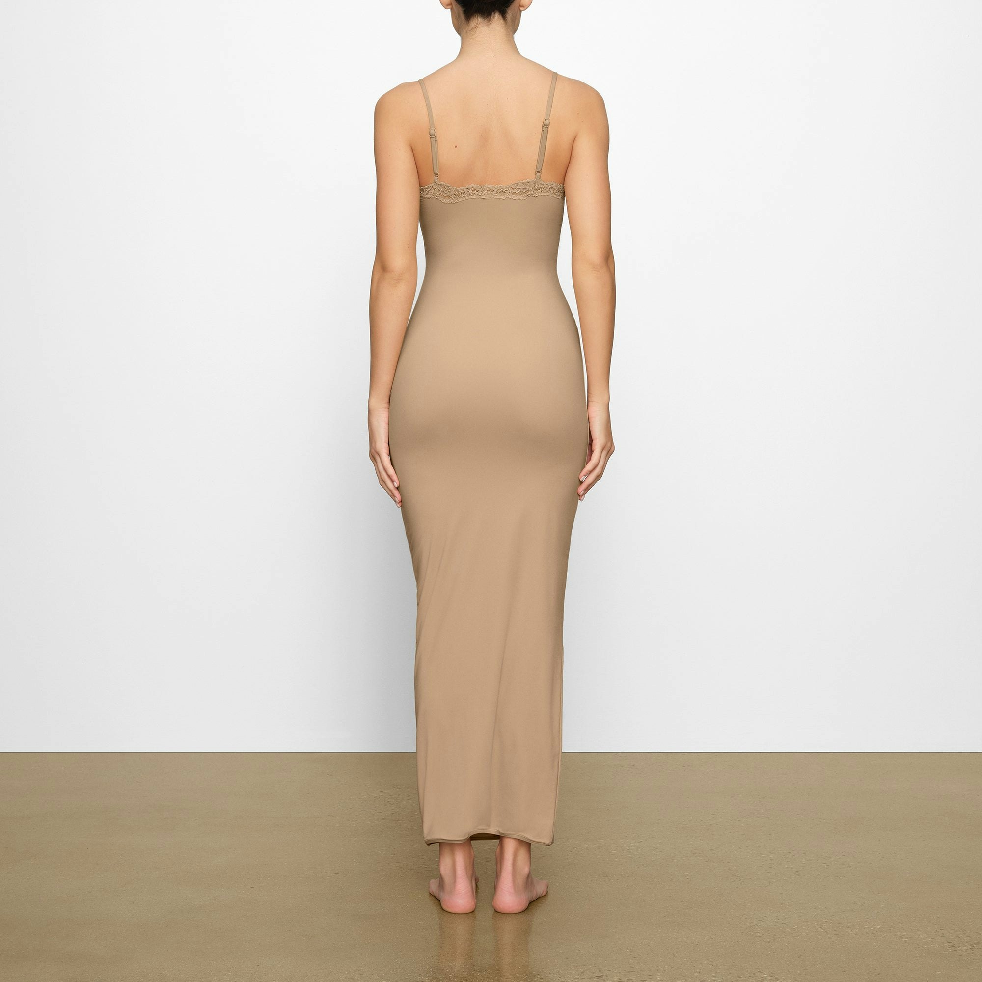 FITS EVERYBODY LACE LONG SLIP DRESS WORN BY A MODEL IN BACK VIEW