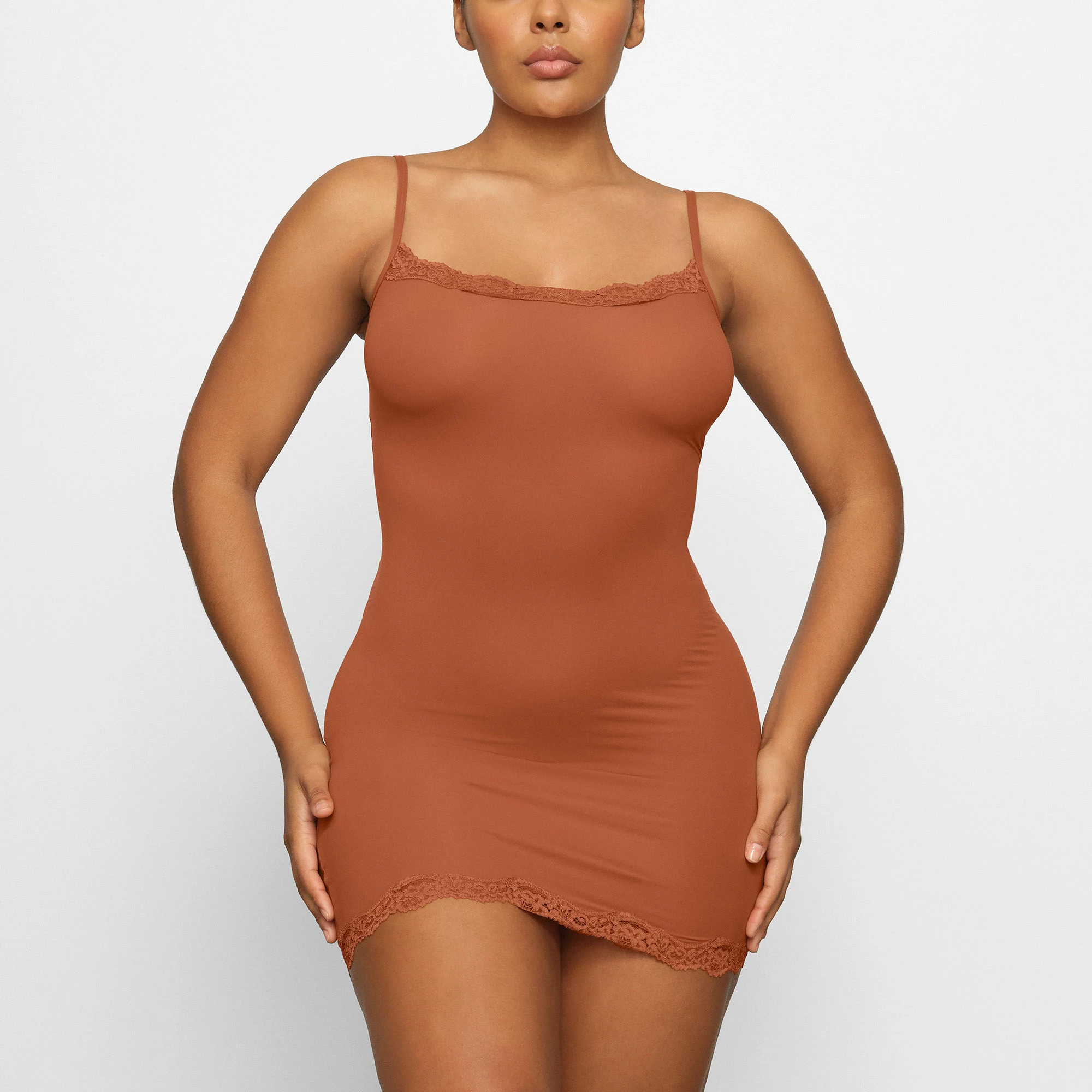 FITS EVERYBODY LACE SLIP DRESS WORN BY A MODEL IN FRONT VIEW | SEE: M, L, XL