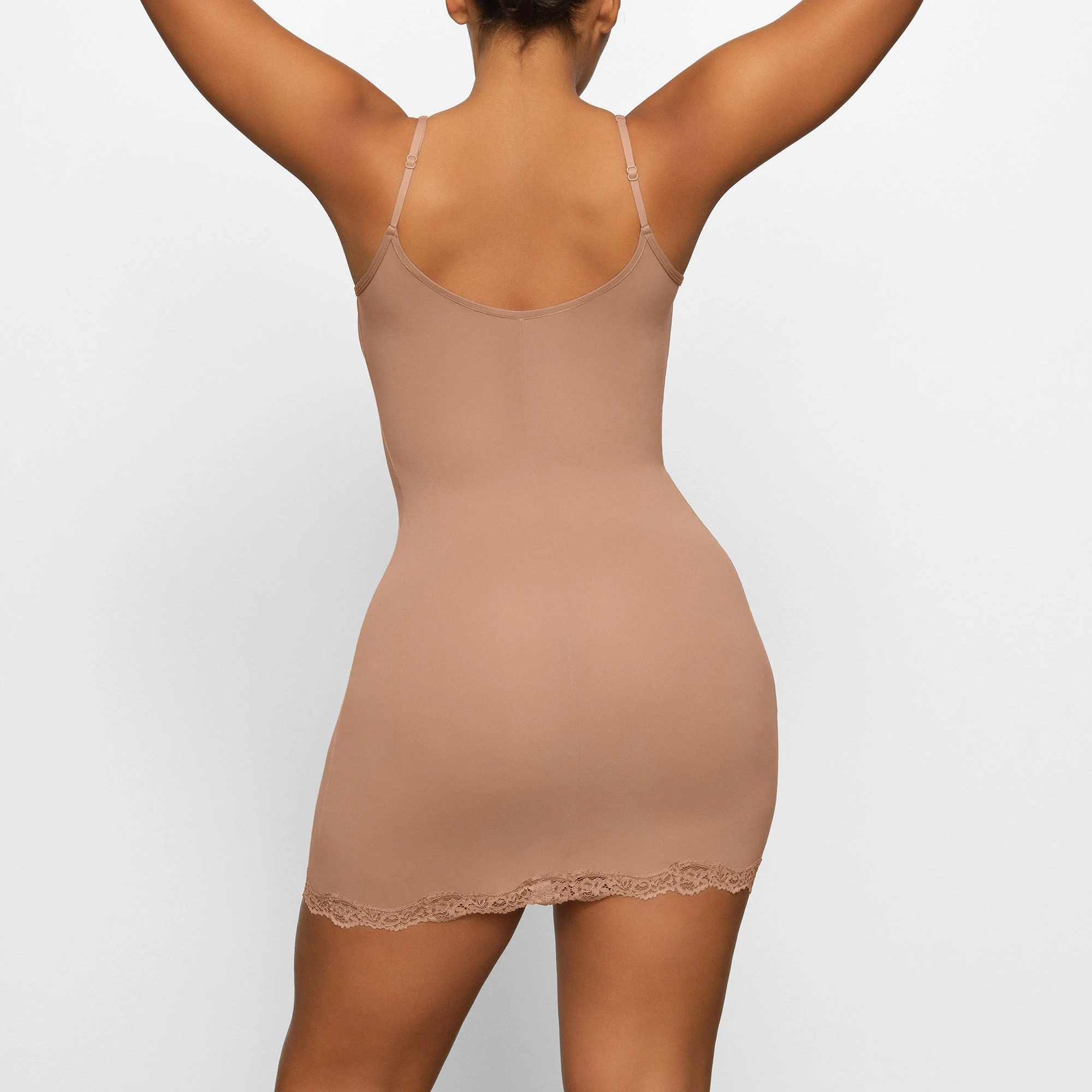 FITS EVERYBODY LACE SLIP DRESS WORN BY A MODEL IN BACK VIEW