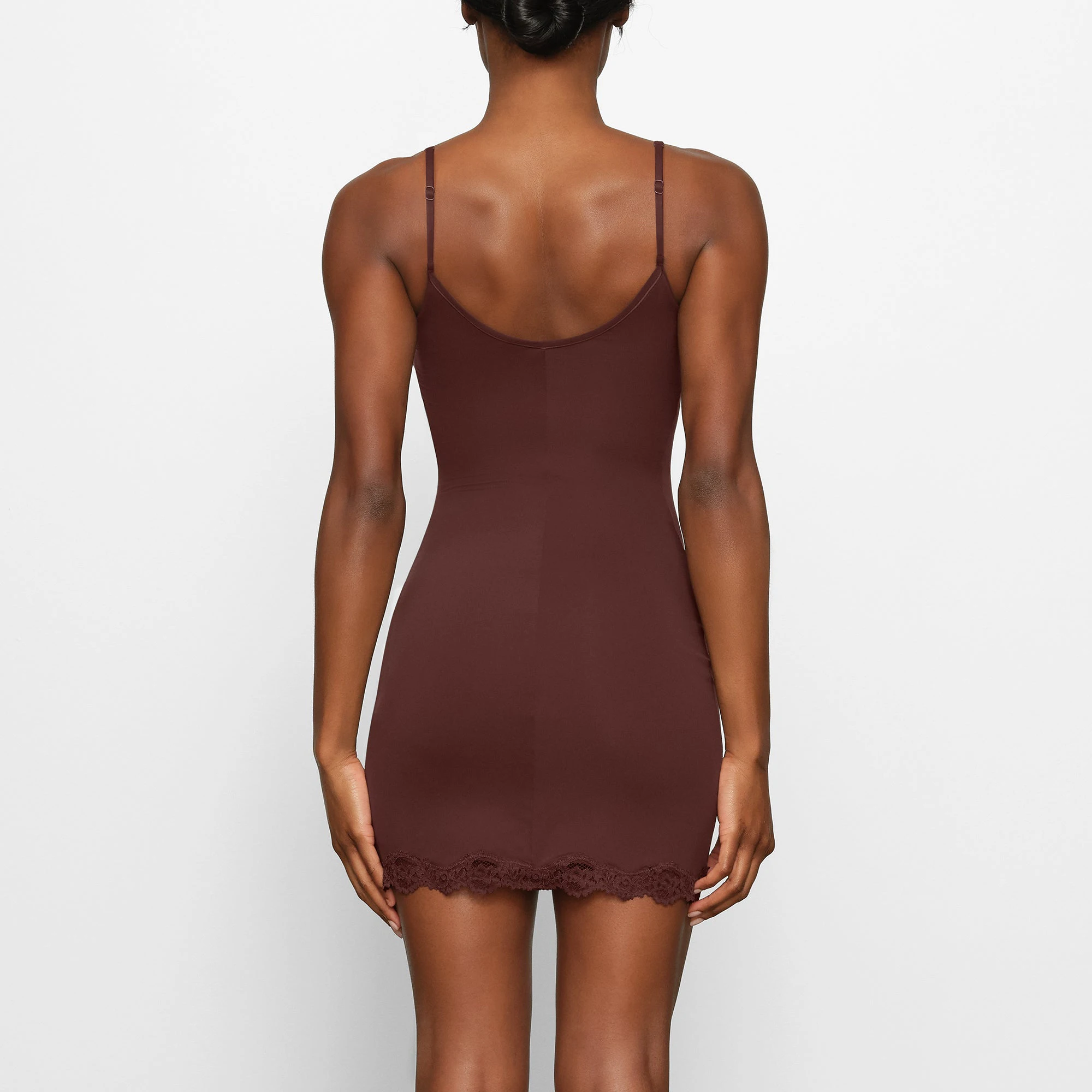 FITS EVERYBODY LACE SLIP DRESS WORN BY A MODEL IN BACK VIEW