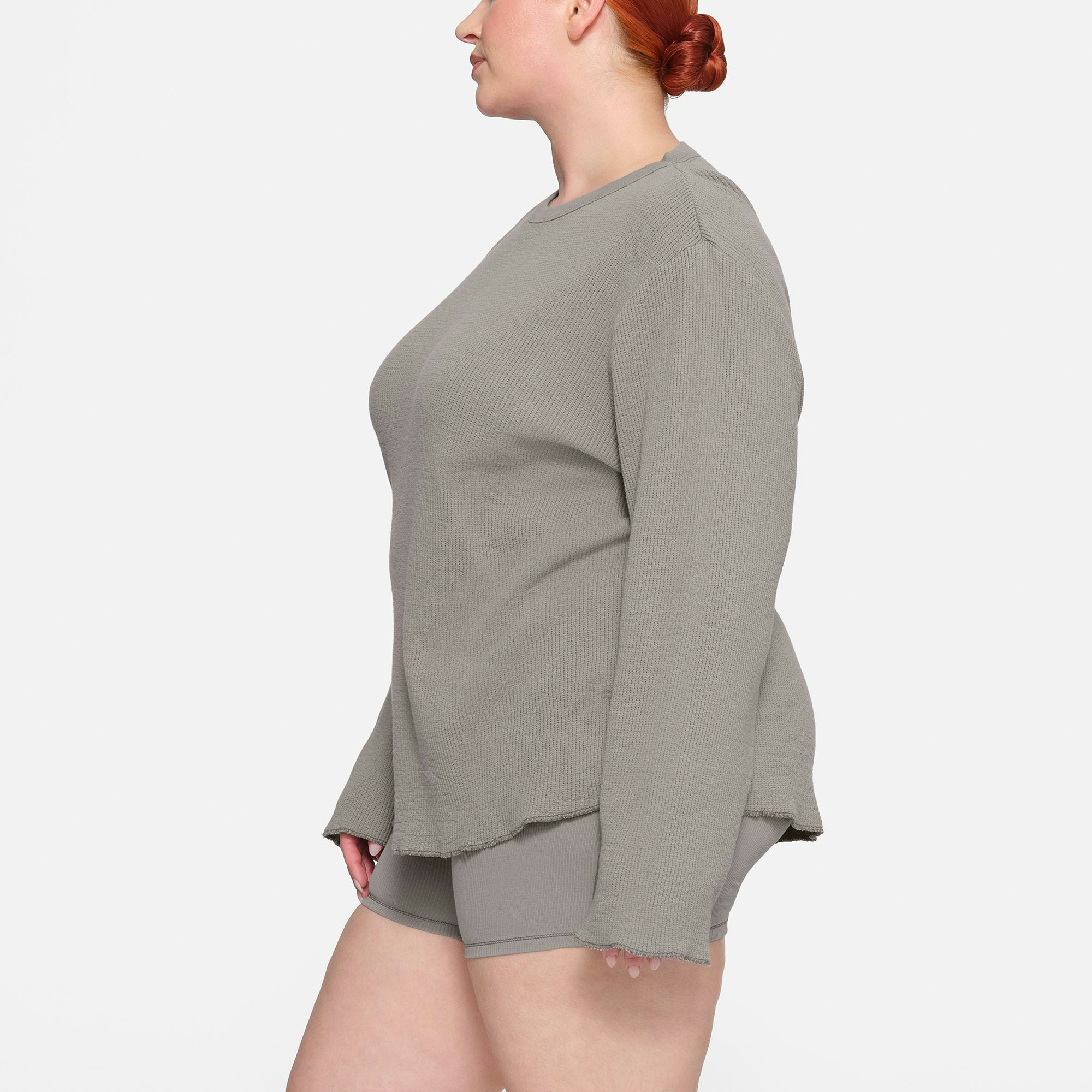 WAFFLE LONG SLEEVE T-SHIRT ON A MODEL IN SIDE VIEW