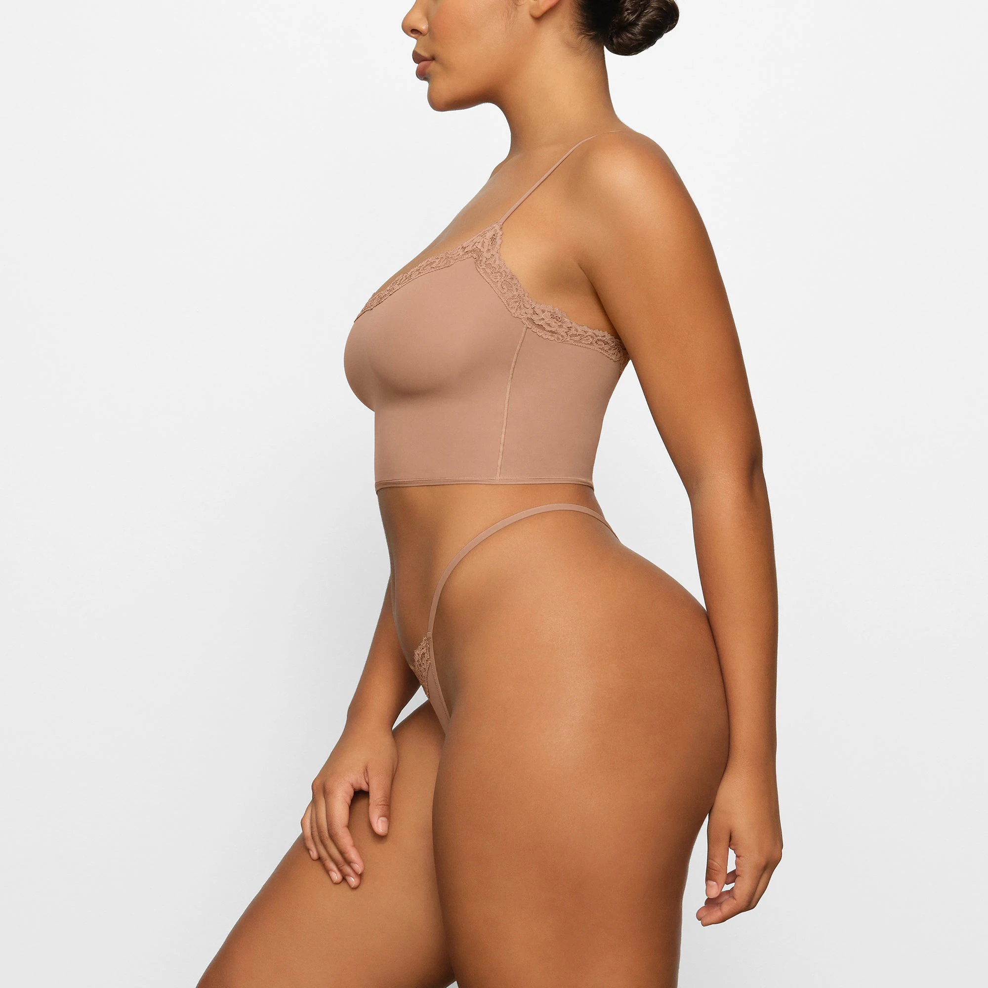 FITS EVERYBODY LACE CAMI WORN BY A MODEL IN SIDE VIEW