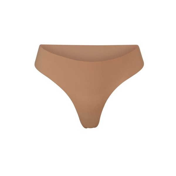 NAKED DIPPED THONG | SIENNA (THONGS, PANTIES) LAYS FLAT ON A WHITE BACKGROUND | FLT