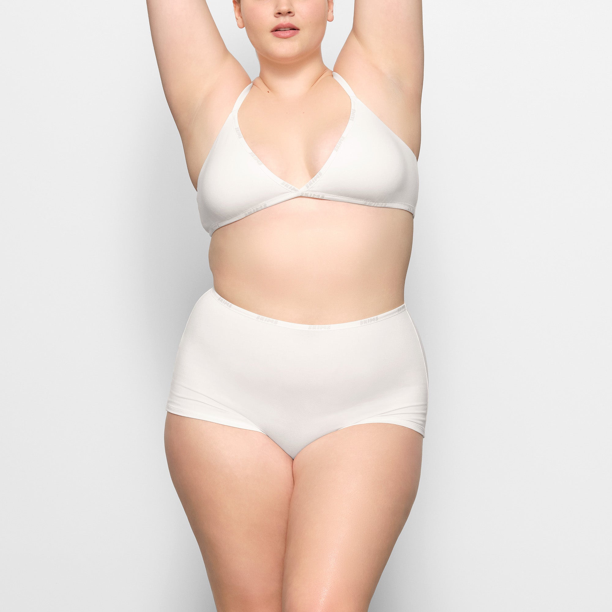 COTTON LOGO HOT PANT WORN BY A MODEL IN FRONT VIEW