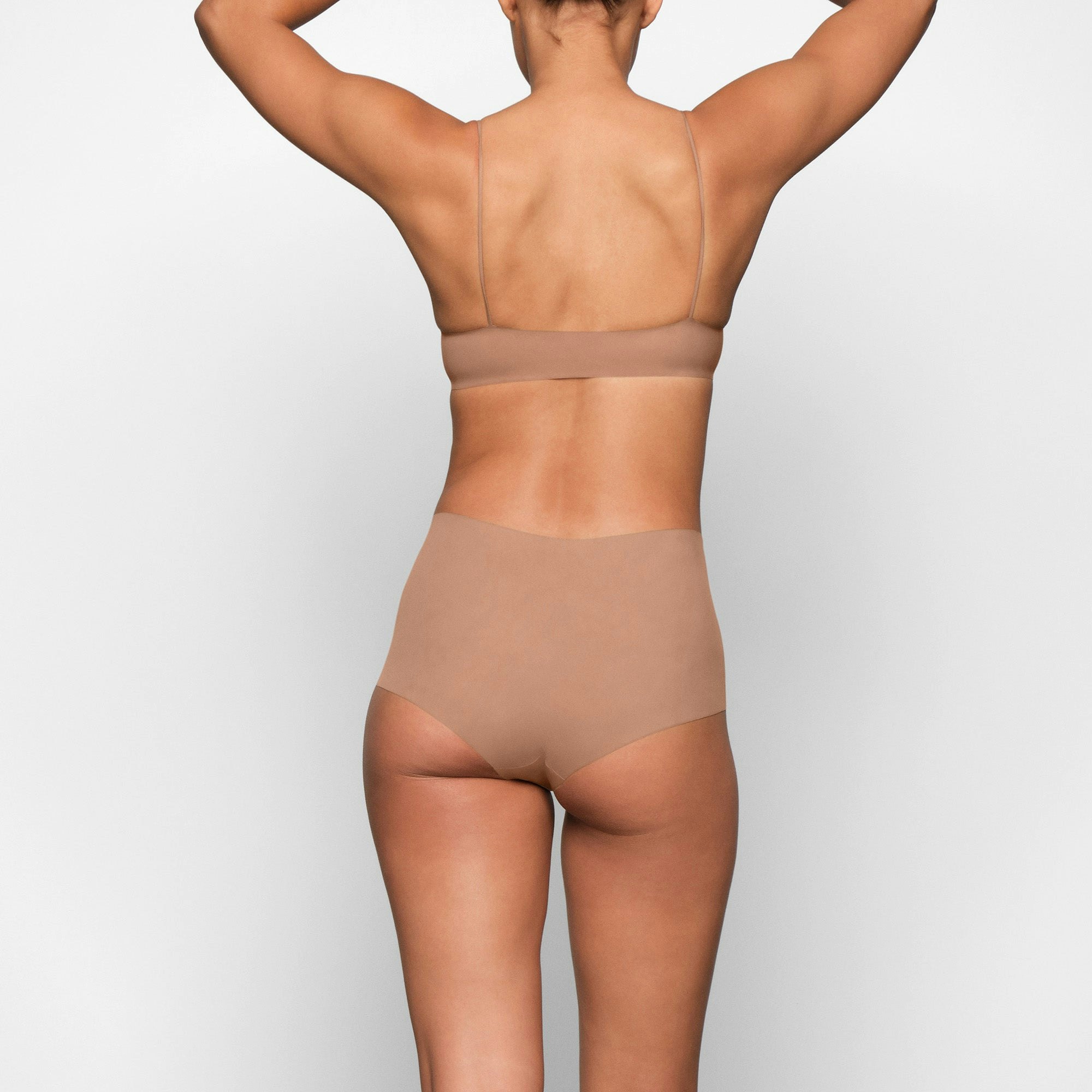 NAKED BOY SHORT WORN  ON A MODEL BACK VIEW