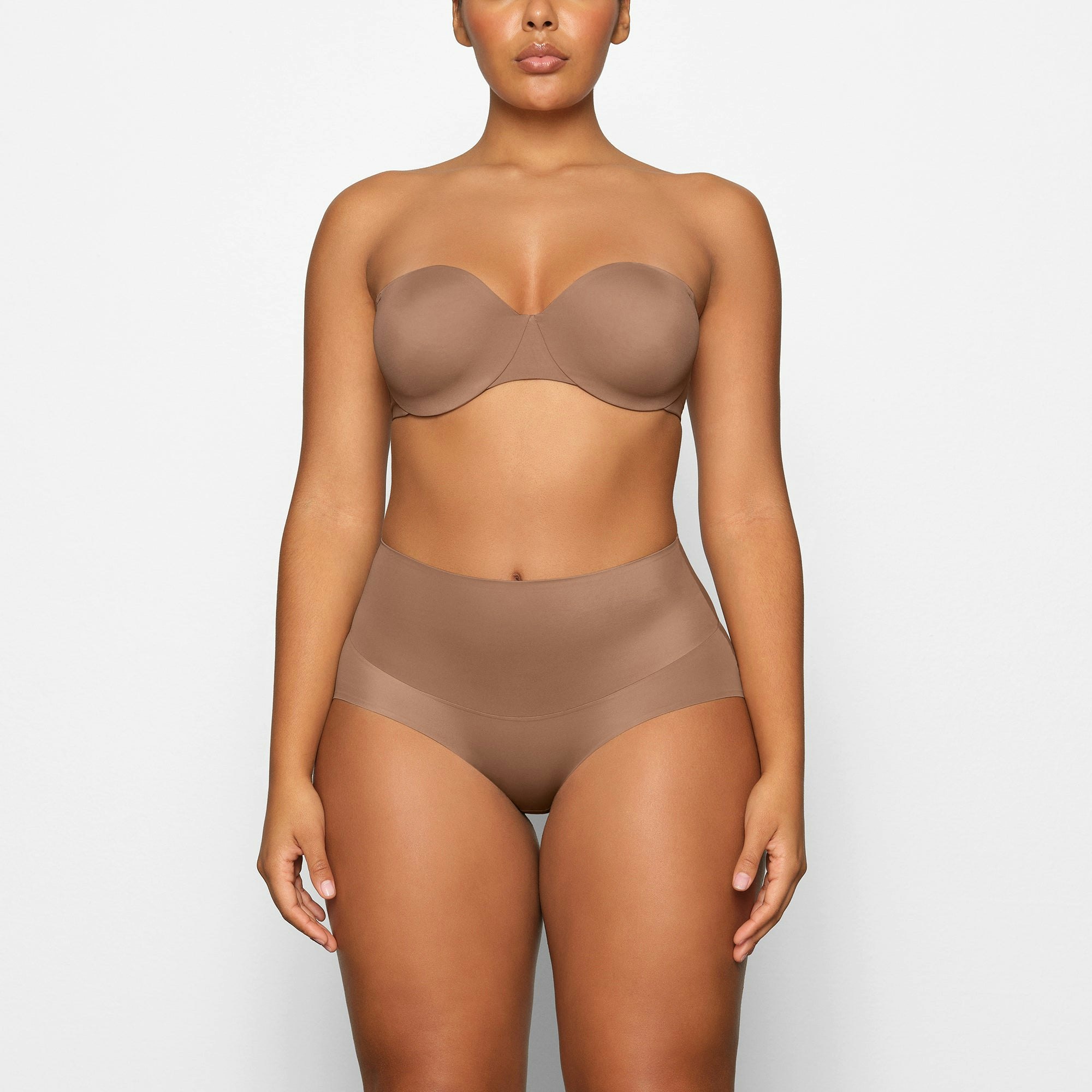 SMOOTHING HIGH WAIST BRIEF WORN BY A MODEL IN FRONT VIEW | SEE: M, L, XL