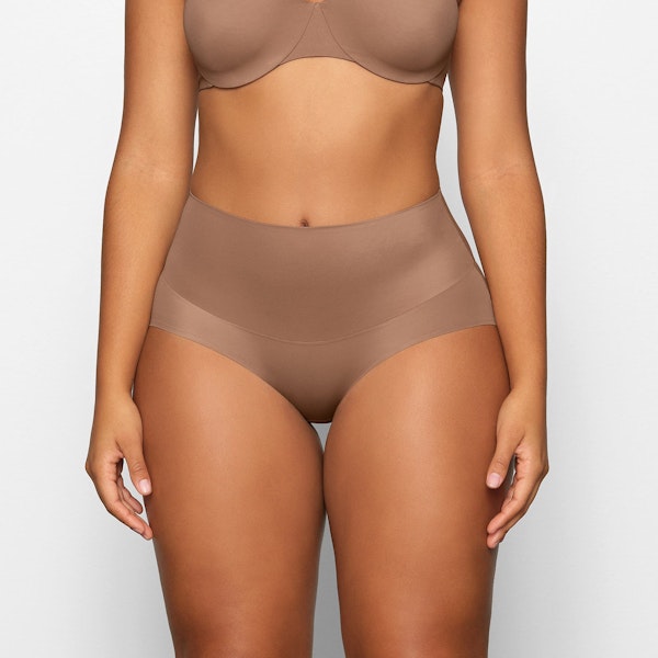 SMOOTHING HIGH WAIST BRIEF WORN BY A MODEL IN FRONT VIEW | SEE: M, L, XL