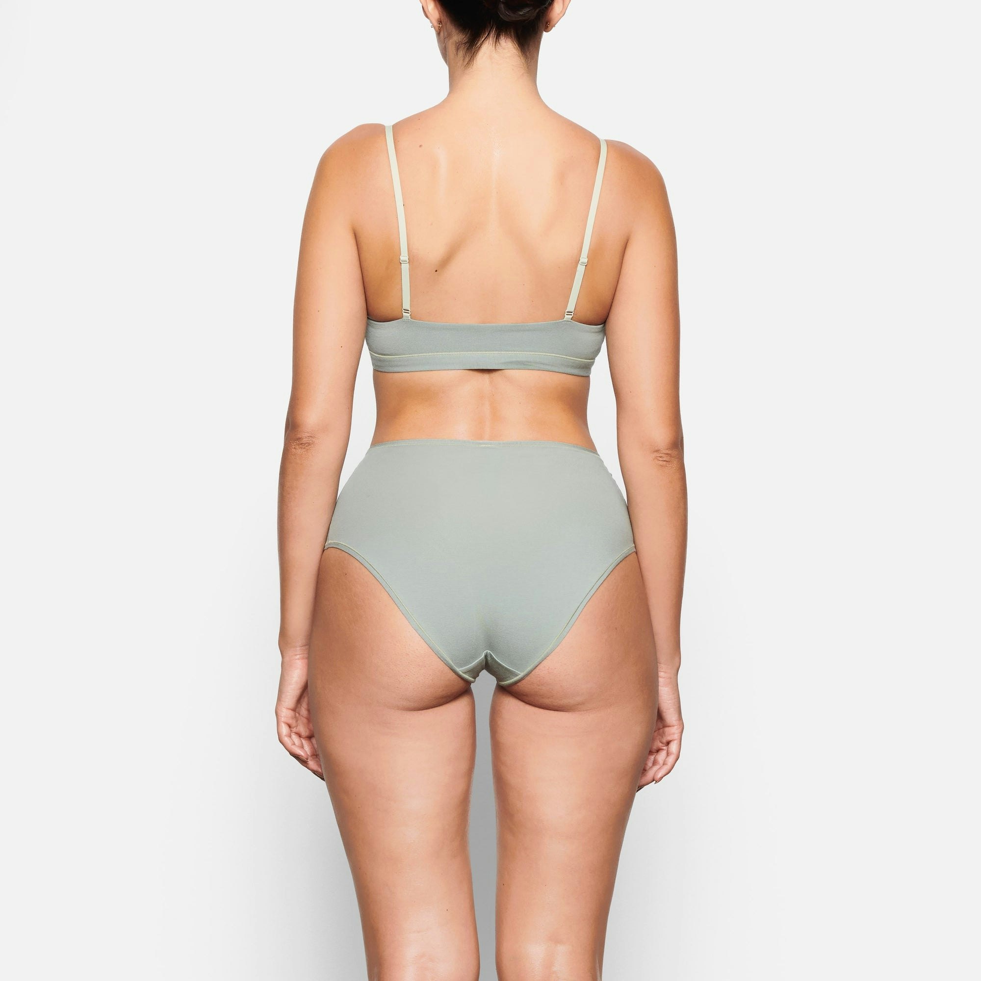 BACK VIEW OF THE COTTON JERSEY FULL BRIEF ON A MODEL