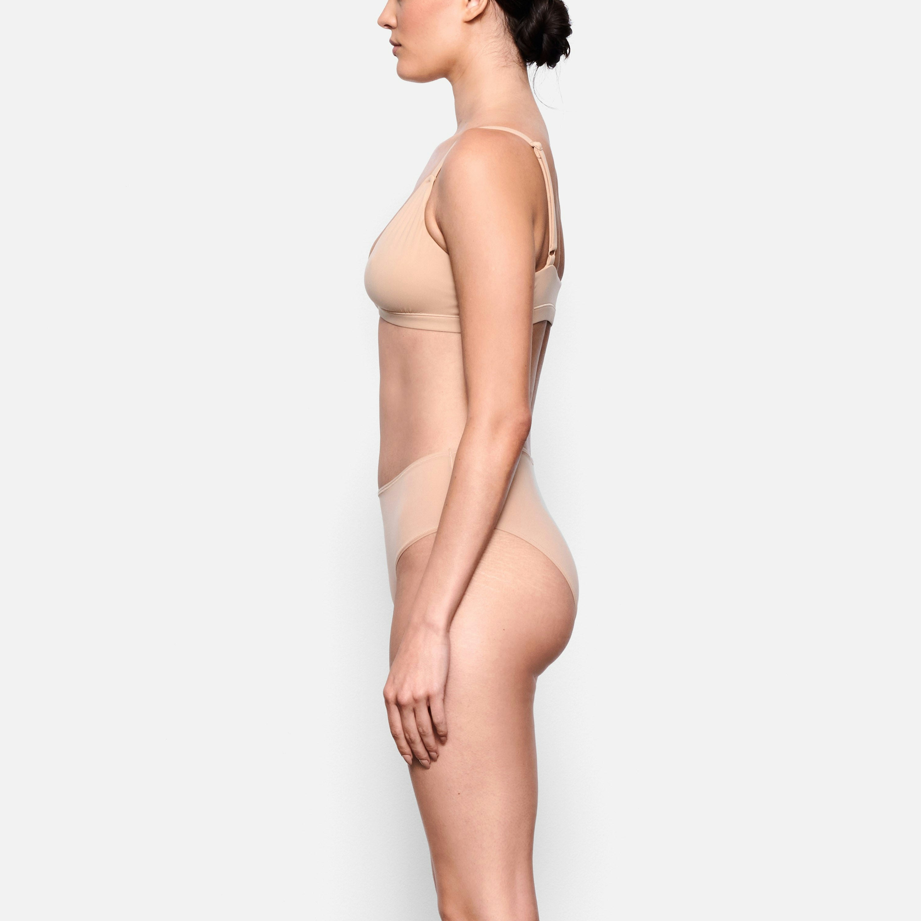 SIDE VIEW OF THE FITS EVERYBODY MID RISE BRIEF ON A MODEL