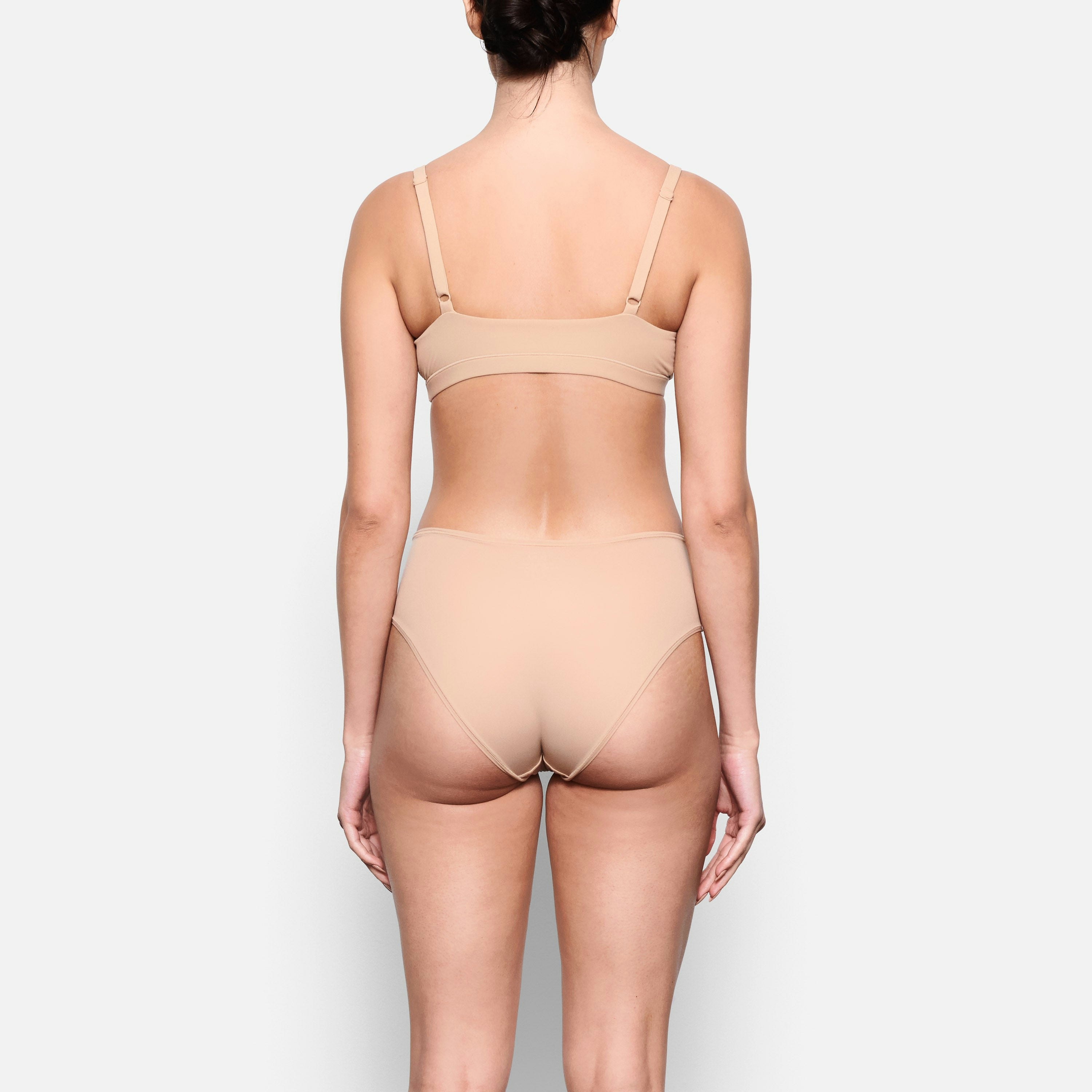 BACK VIEW OF THE FITS EVERYBODY MID RISE BRIEF ON A MODEL