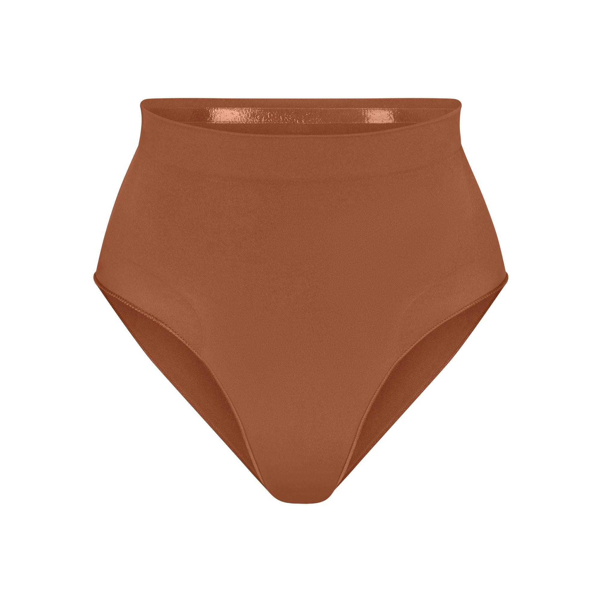 SEAMLESS SCULPT MID WAIST BRIEF | BRONZE (SHAPEWEAR BRIEFS, PANTIES) LAYS FLAT ON A WHITE BACKGROUND | FLT
