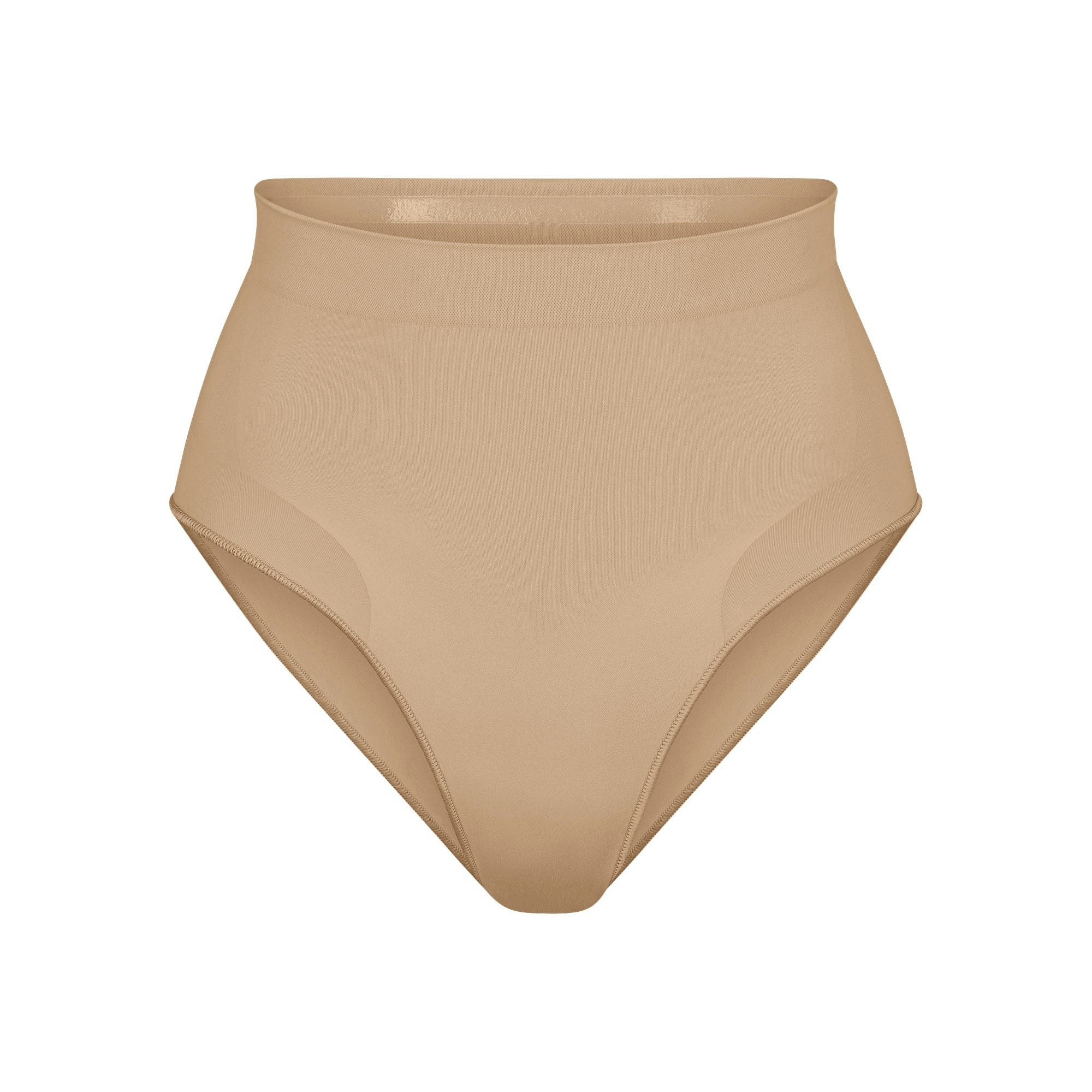 SEAMLESS SCULPT MID WAIST BRIEF | CLAY (SHAPEWEAR BRIEFS, PANTIES) LAYS FLAT ON A WHITE BACKGROUND | FLT
